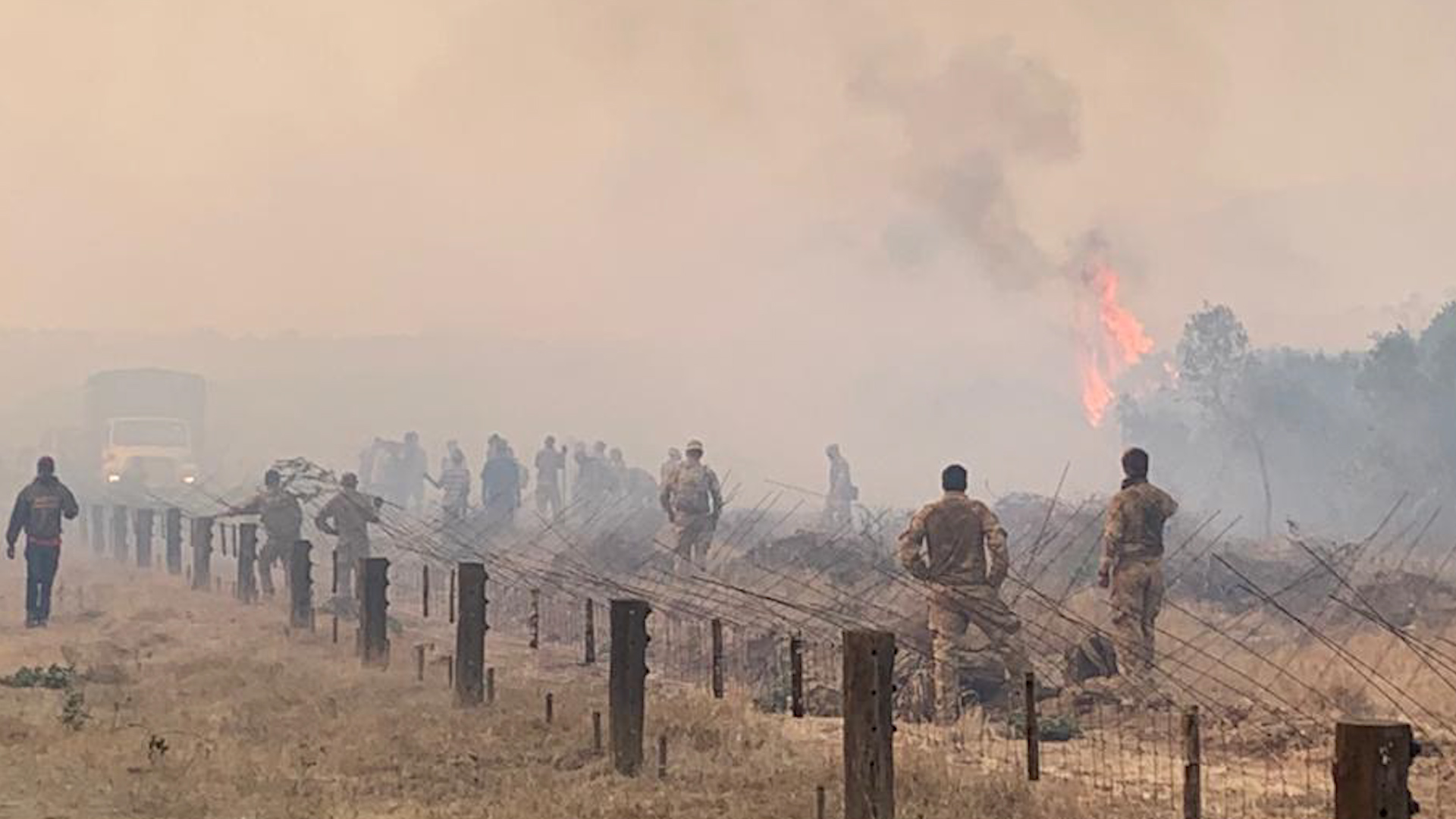 Cover image: British troop fight the fire (Picture: British Army/Twitter).