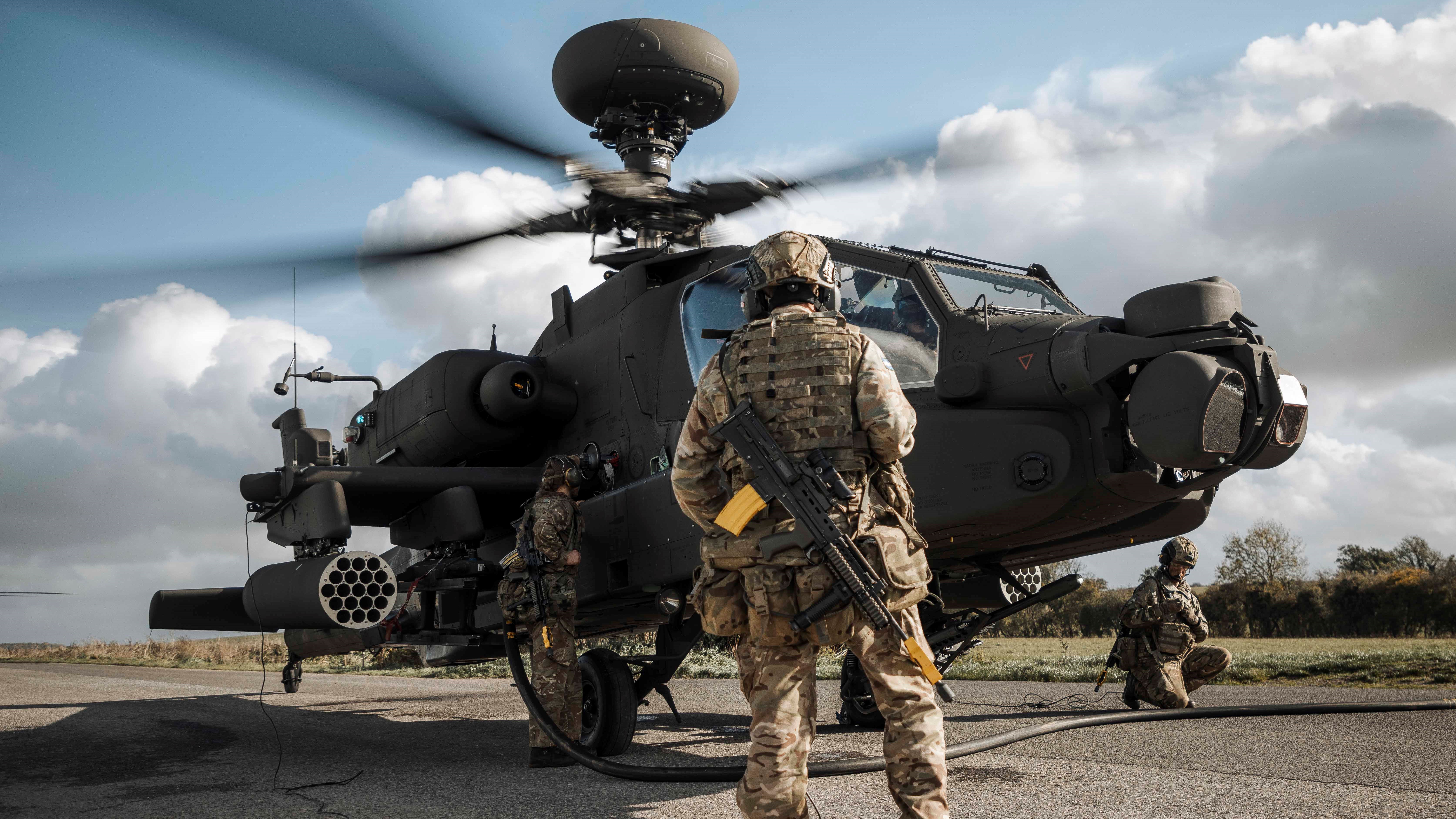 British Army's Apache AH64-E being refuelled on a blocked road (Picture: MOD Crown).