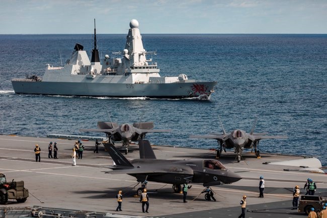 British F-35Bs parked on HMS Queen Elizabeth with HMS Dragon in background (Picture MOD).