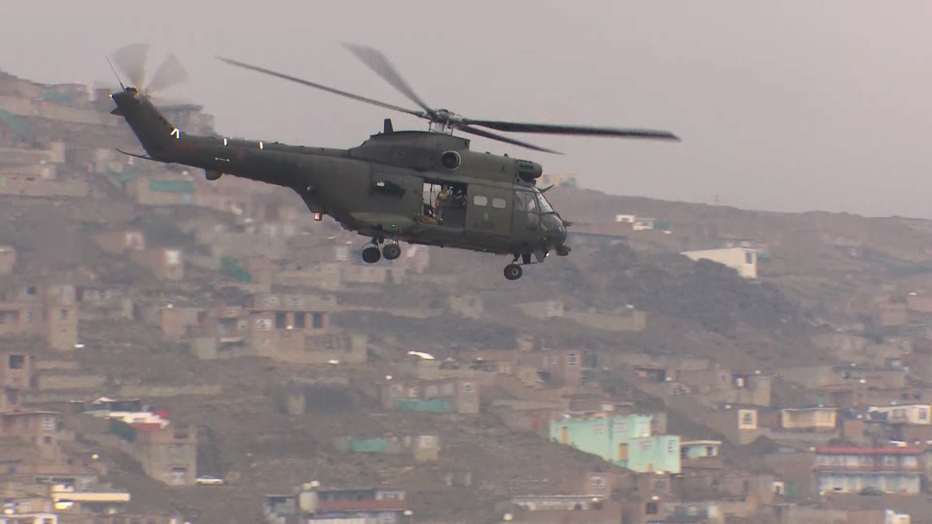 A British puma helicopter flies over the Afghan capital Kabul in 2018.