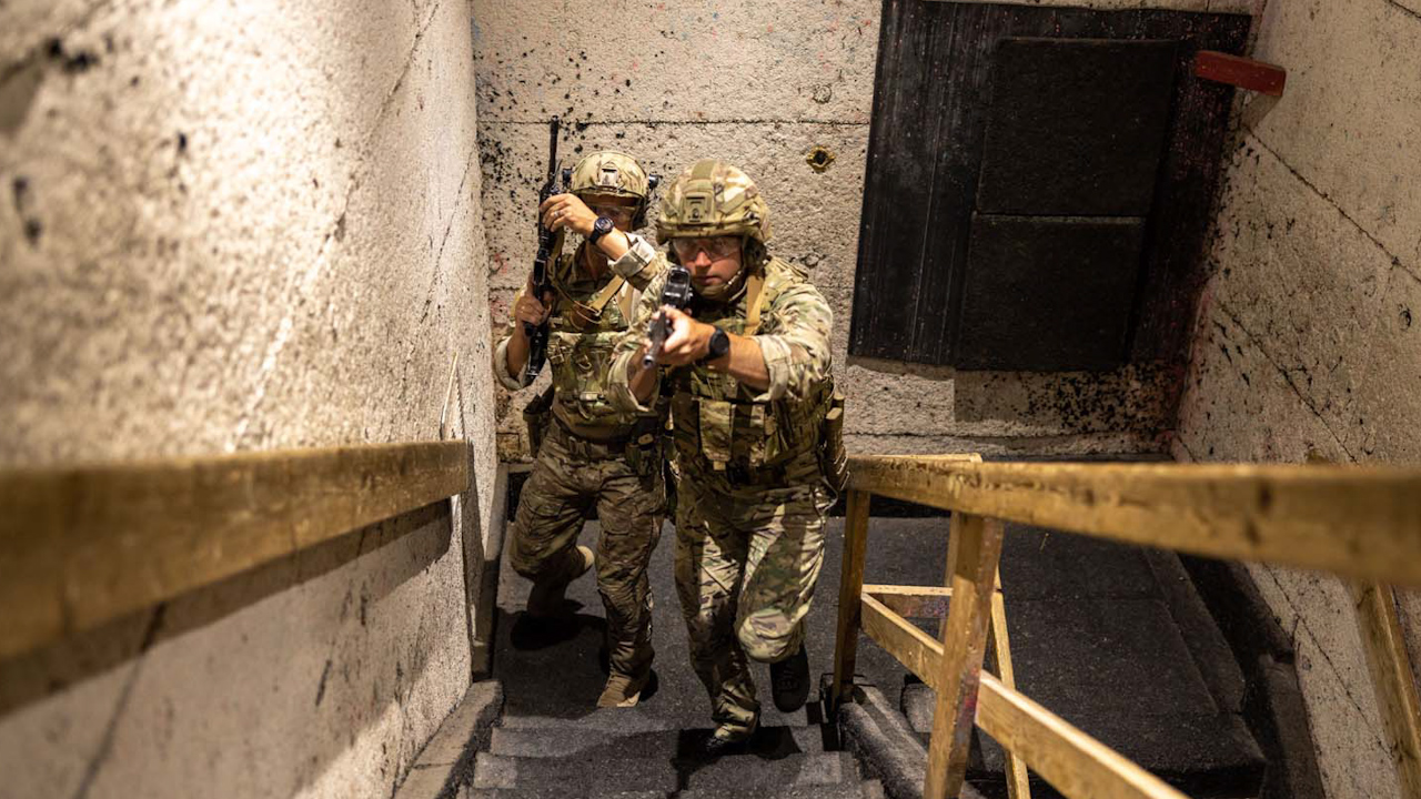 British Royal Marine Commandos practice room clearing a stairwell during close-quarters battle training at Naval Support Activity Northwest Annex, Chesapeake Virginia (Picture: SSgt. Servante R. Coba).