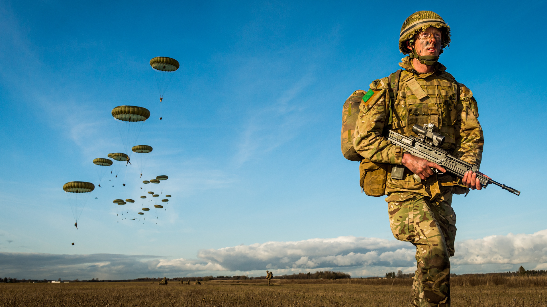A British paratrooper lands in Nurmsi (Picture: British Army).