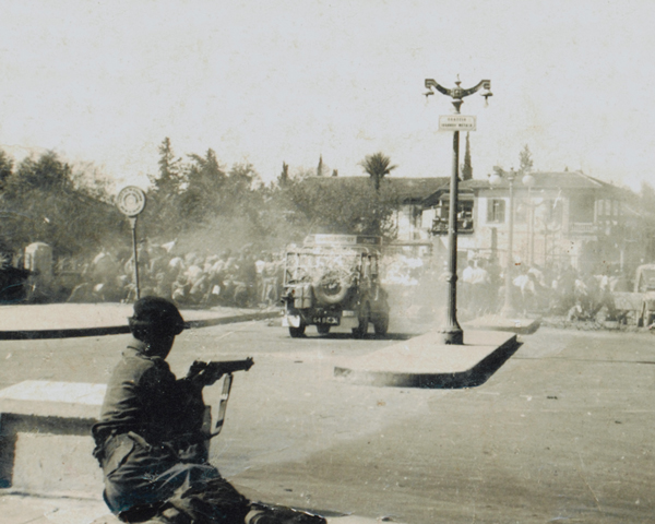 British soldiers fighting against a street riot by EOKA in Nicosia, Cyprus, 1956. 