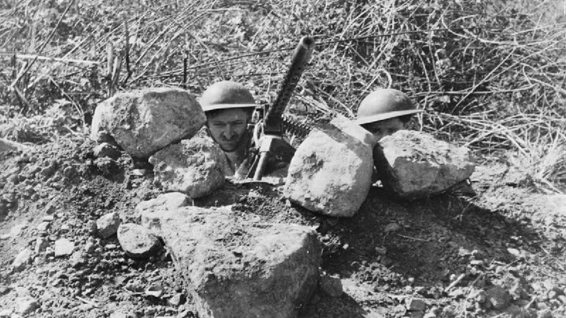 British soldiers man a .30 cal machine gun as they prepare to defend Kohima ridge and the strategically crucial supply depot nearby from advancing Japanese forces (Picture: Alamy)