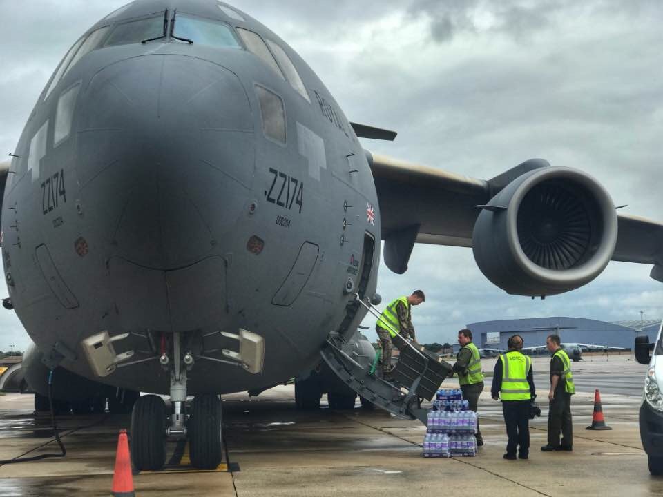 Aid supplies are loaded onto an RAF transport plane following Hurricane Irma