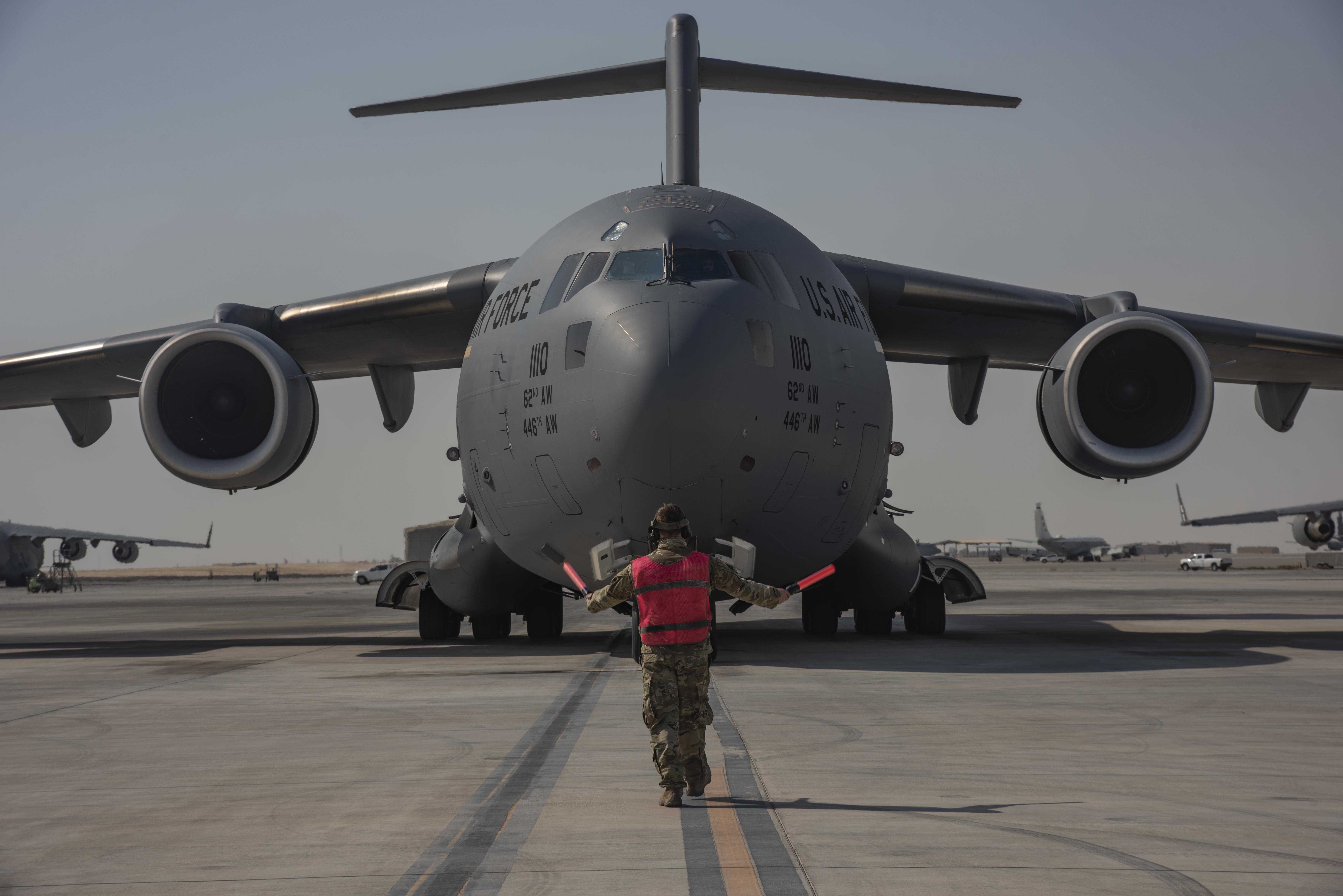 A C-17 aircraft supporting the drawdown taxis at Al Udeid aair base in Qatar