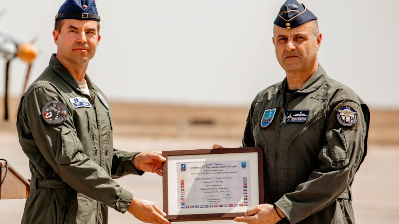 Deputy Commander of Nato’s Southern Combined Air Operations Centre, Brigadier General Avraam Kazantzoglou, presented the mission-ready certificate to the Finnish Detachment Commander Lieutenant Colonel Rami Lindström (Picture: Nato/ Bogdan Pantilimon)