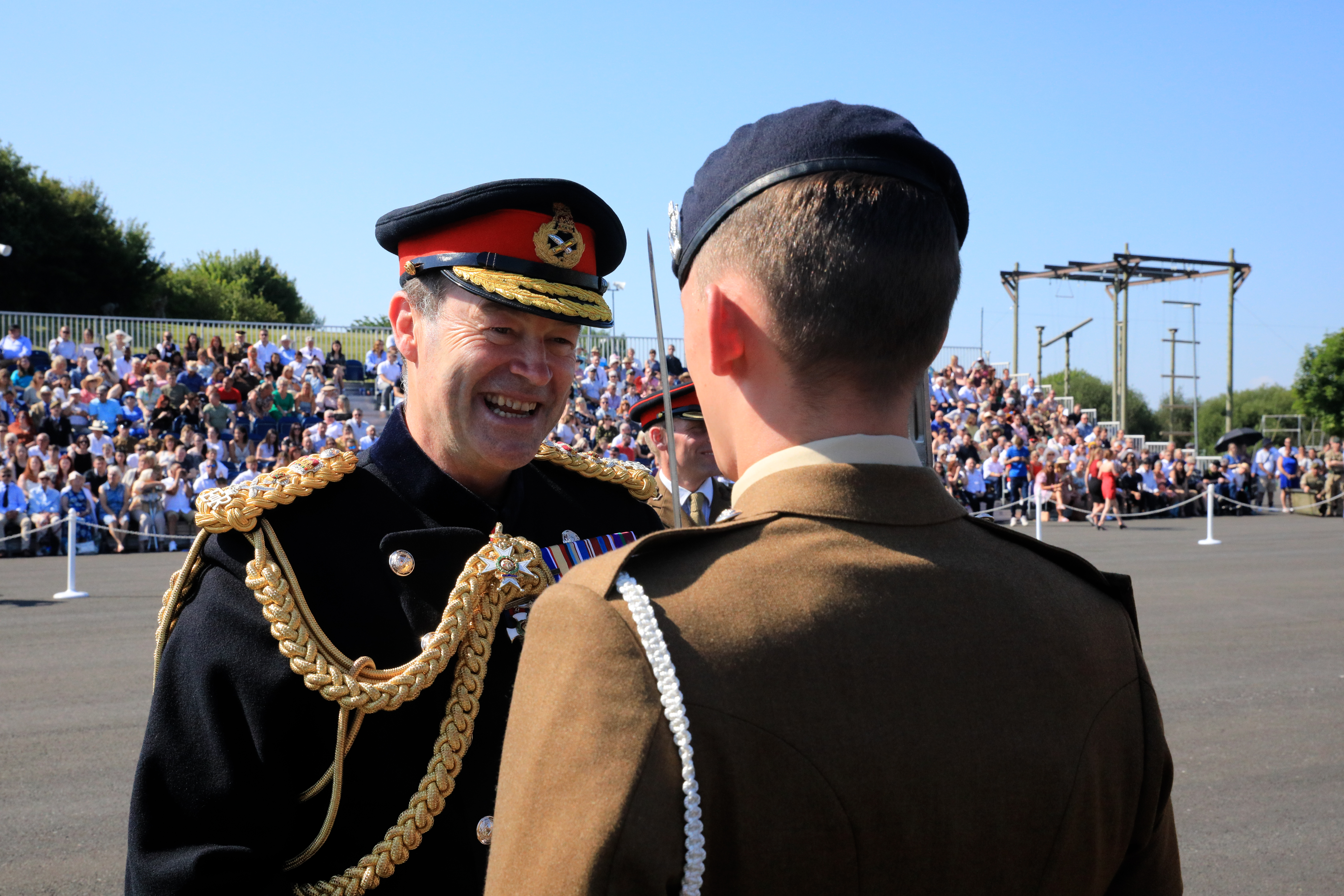 CGS General Sir Patrick Sanders shares a joke with a junior soldiers to mark graduation at AFC Harrogate 110822 CREDIT BFBS JW.jpg