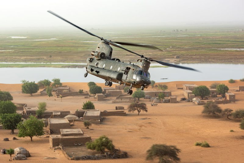 An RAF Chinook flies in Mali