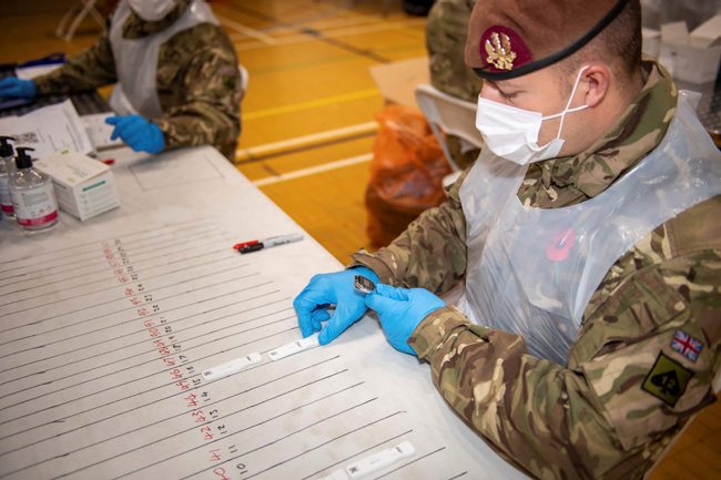 Soldiers from the King's Royal Hussars help with Liverpool's mass testing programme (Picture: MOD).