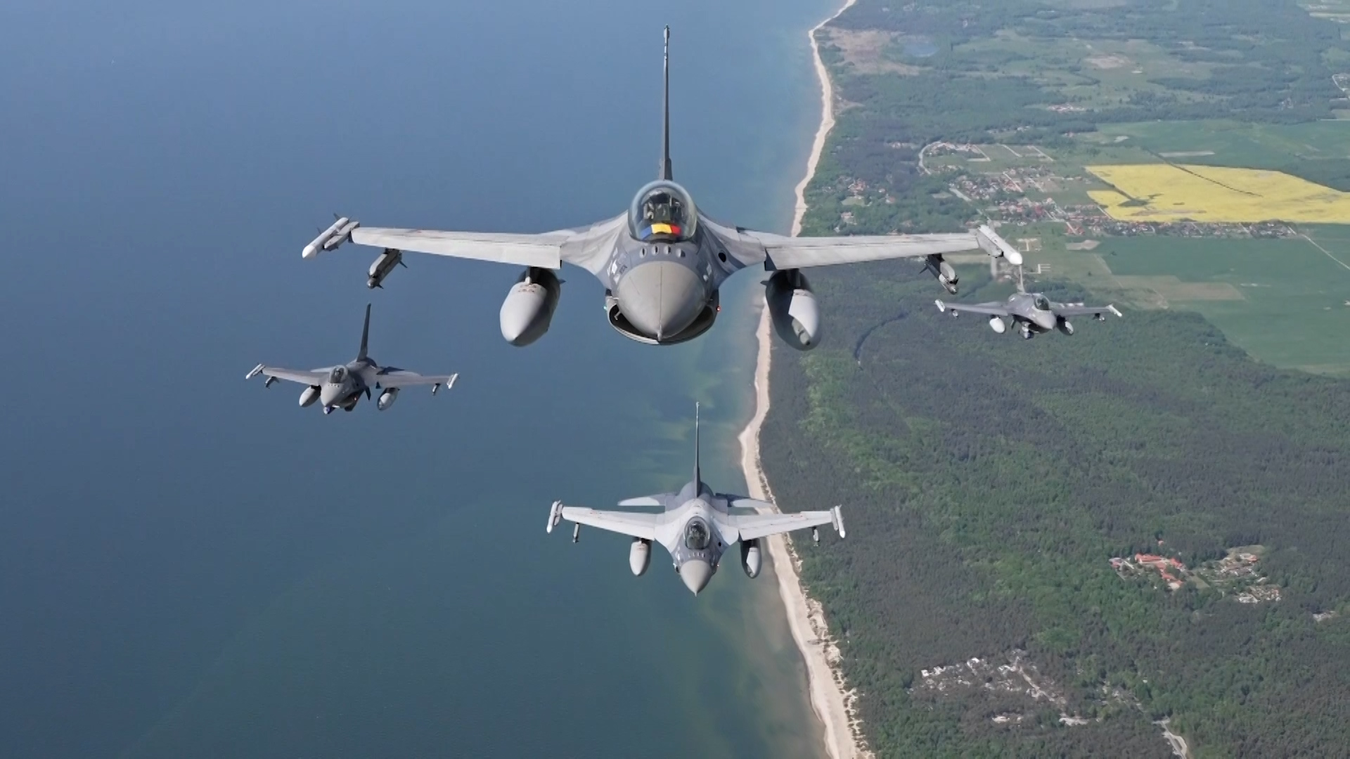 Portuguese and Romanian jets assigned to Baltic Air Policing fly over Lithuania SCREENGRAB 1 CREDIT NATO