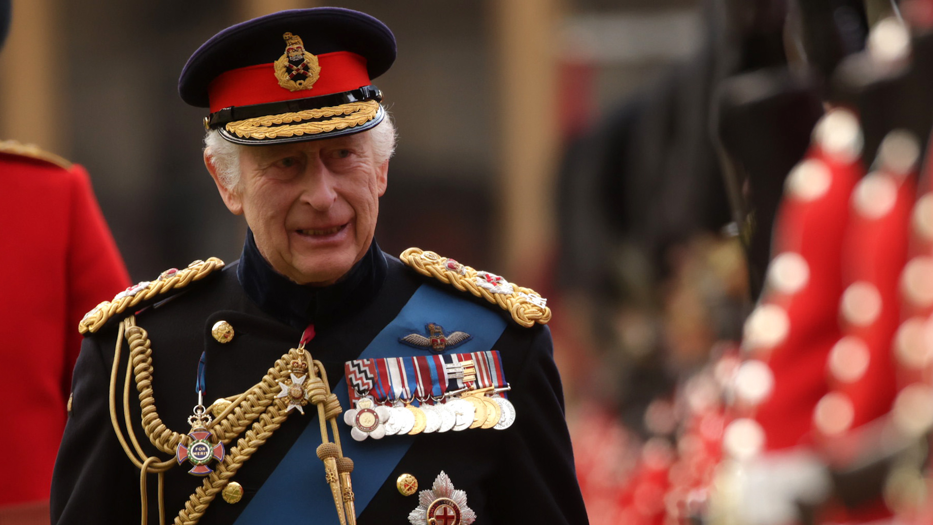  King inspects troop after presenting new colours to No 9 and No 12 Irish Guards at Windsor Castle 