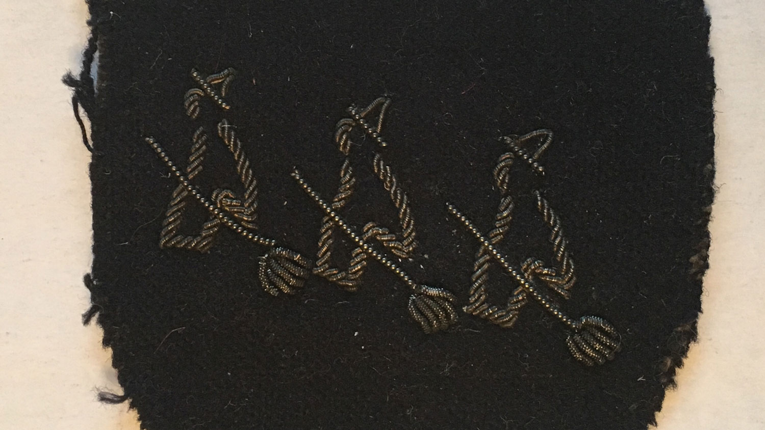CROPPED 16 x 9 Three Witches on Broomsticks emblem was used by Intelligence School 9, part of MI9, during their covert operations in Holland, 1944 CREDIT Dr Helen Fry