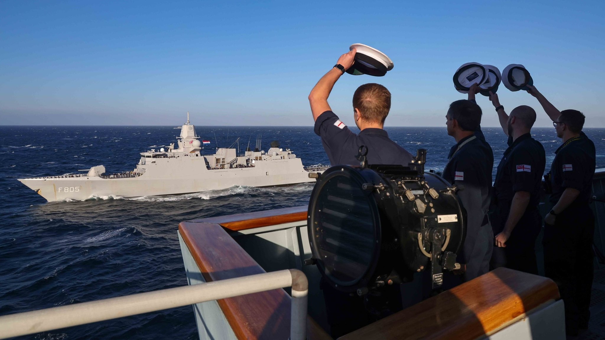 Royal Navy personnel wave goodbye to HNLMS Evertsen