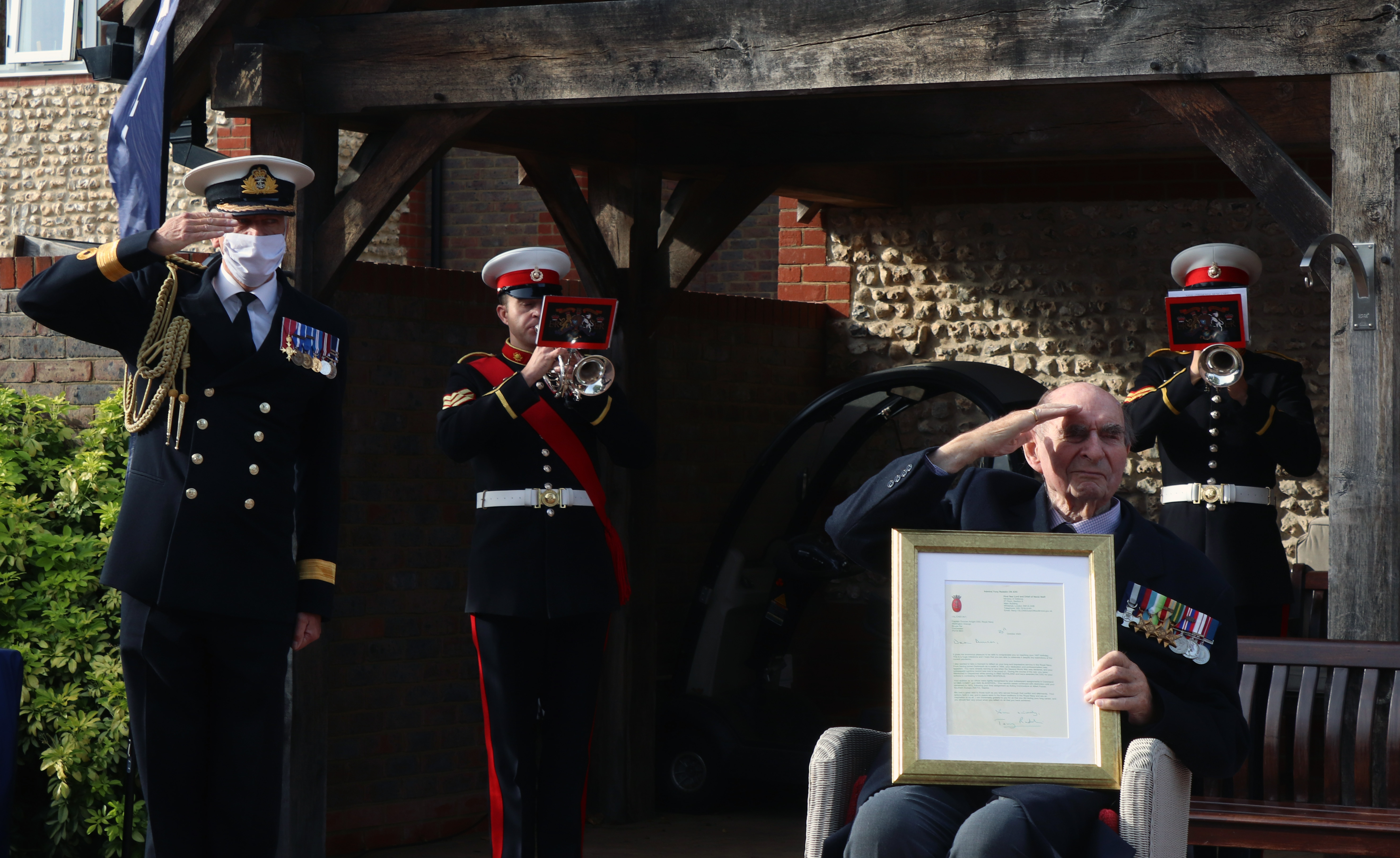 Cover image: Captain Knight receiving the framed letter written by the First Sea Lord (Picture: Royal Navy).