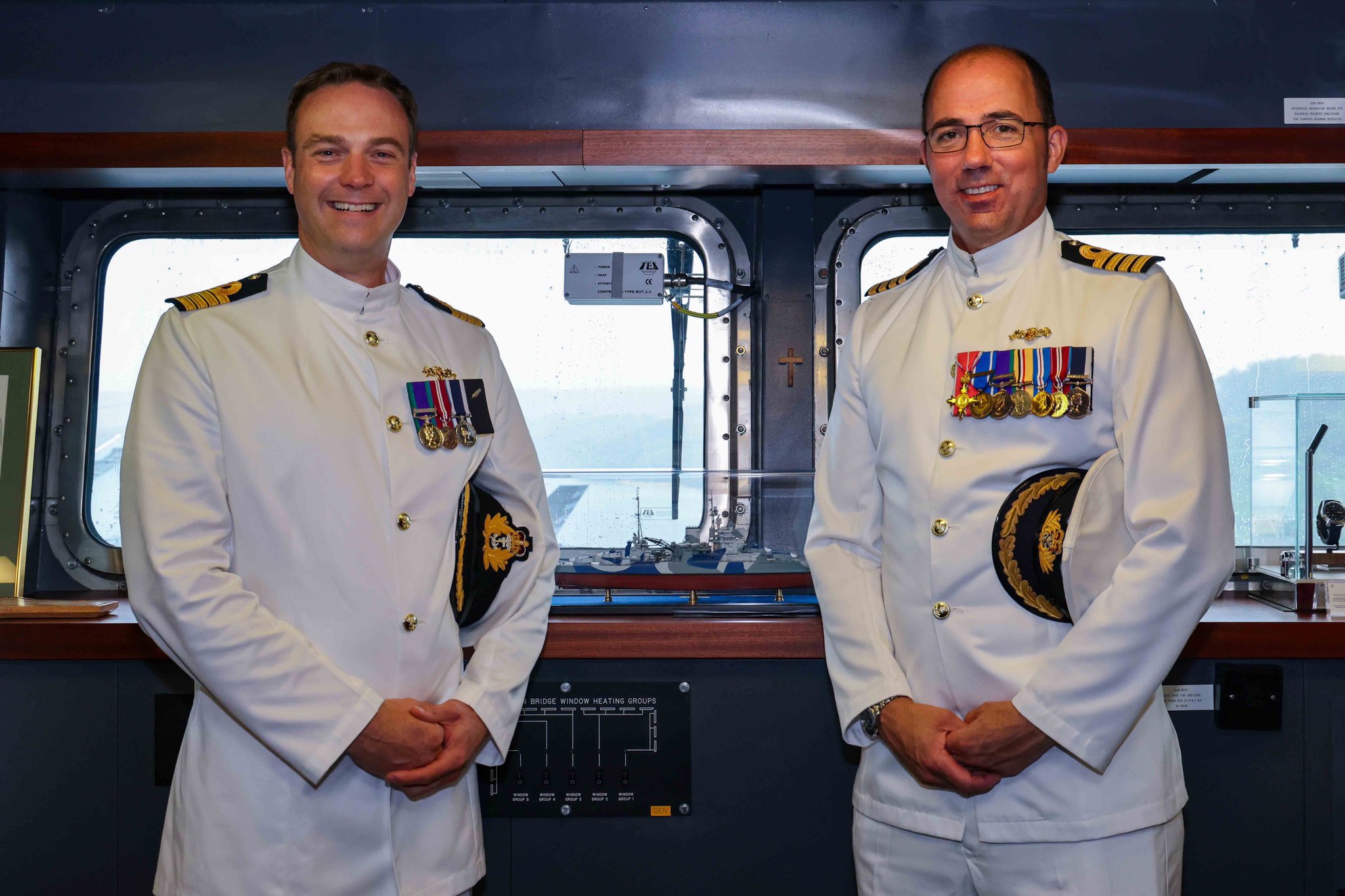 Captain Ian Feasey (left) has taken over from Captain Angus Essenhigh (right)