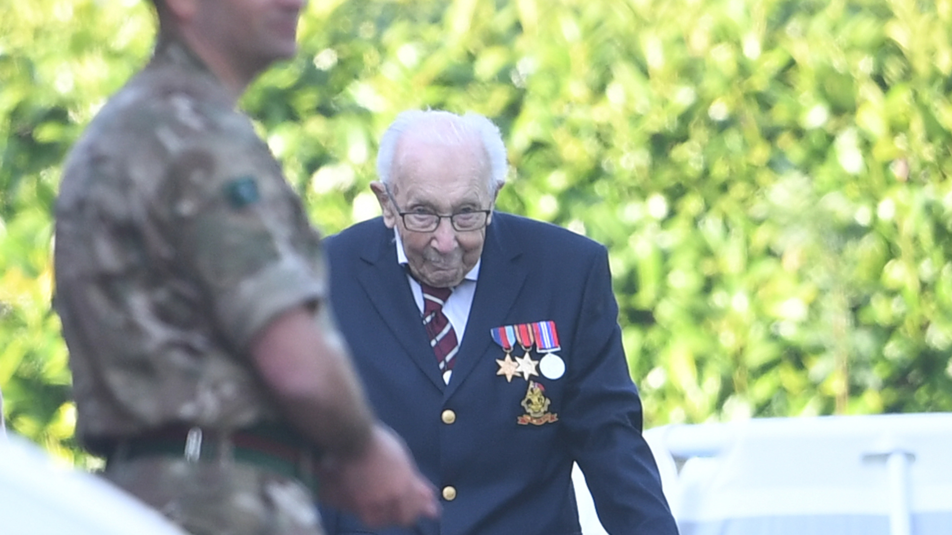 Capt Sir Tom raised more than £32m for the NHS by walking laps of his Bedfordshire garden (Picture: PA).