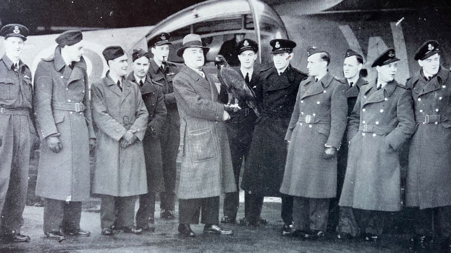 Captain Knight and Mr Ramshaw meet RAF personnel during the Second World War (Picture: Knight family)