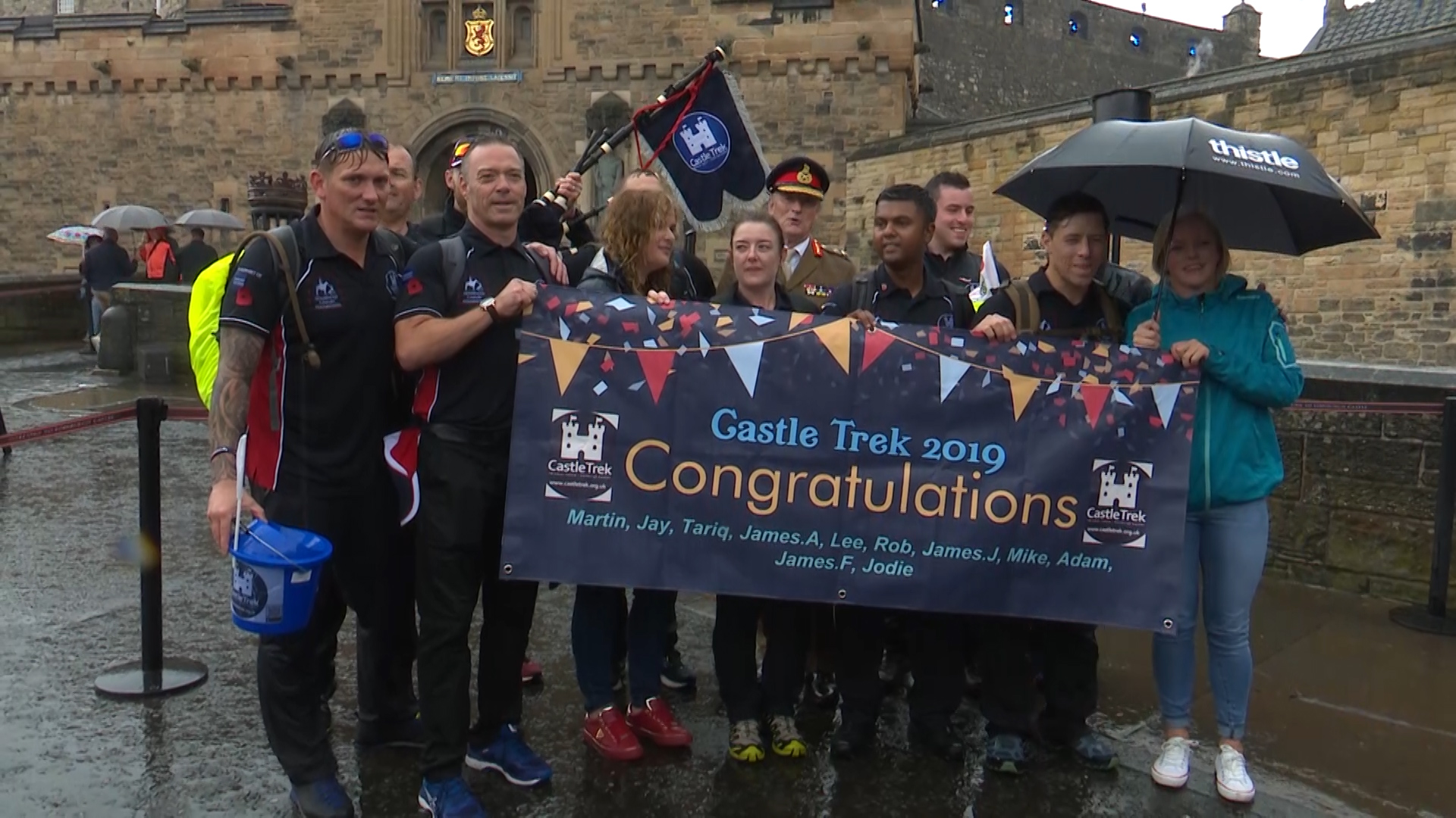 CastleTrek celebrate the completion of their journey in Edinburgh.