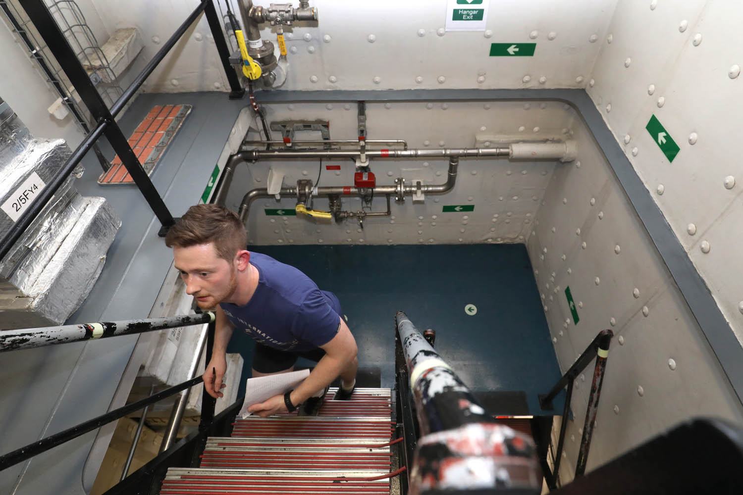 Cover image: Chef James Hopkinson climbs the stairs of HMS Queen Elizabeth (Picture: Royal Navy).