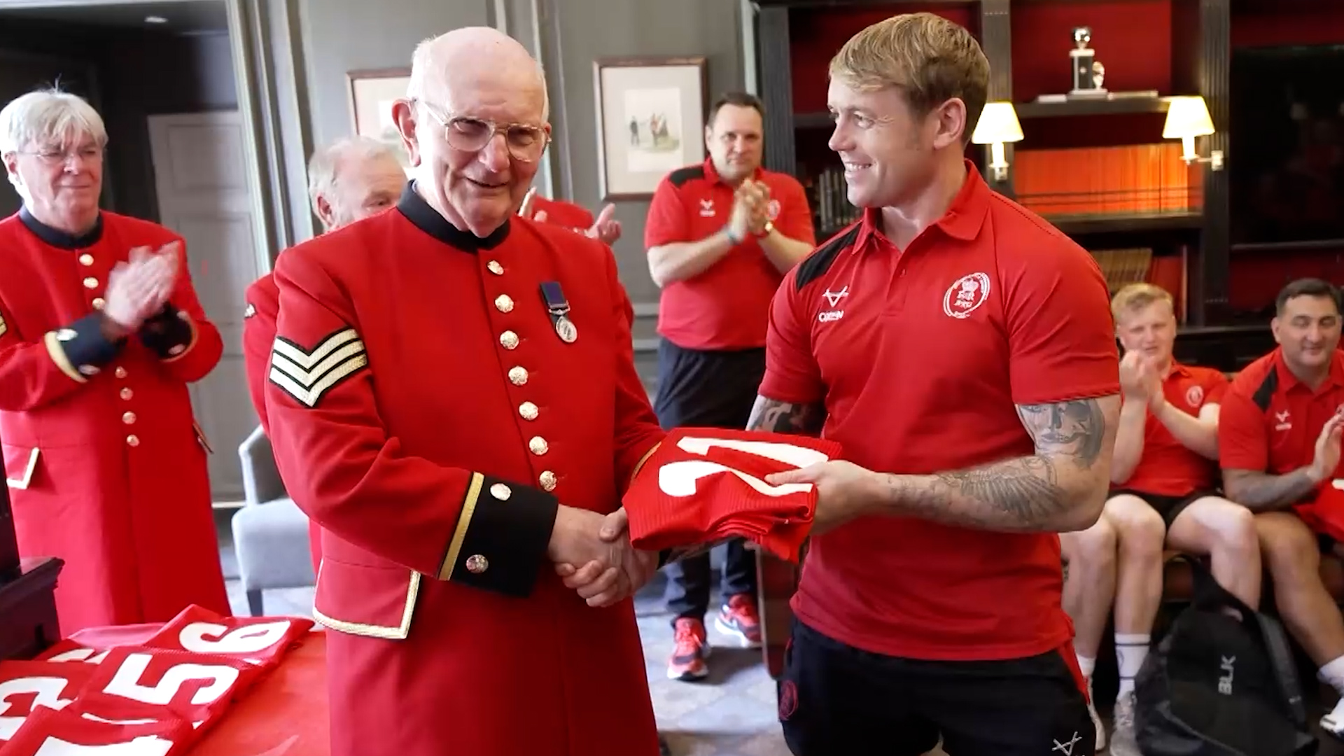 Chelsea Pensioners present Army's Rugby Union side matchday shirts ahead of Twickenham 10052023 CREDIT BFBS.jpg