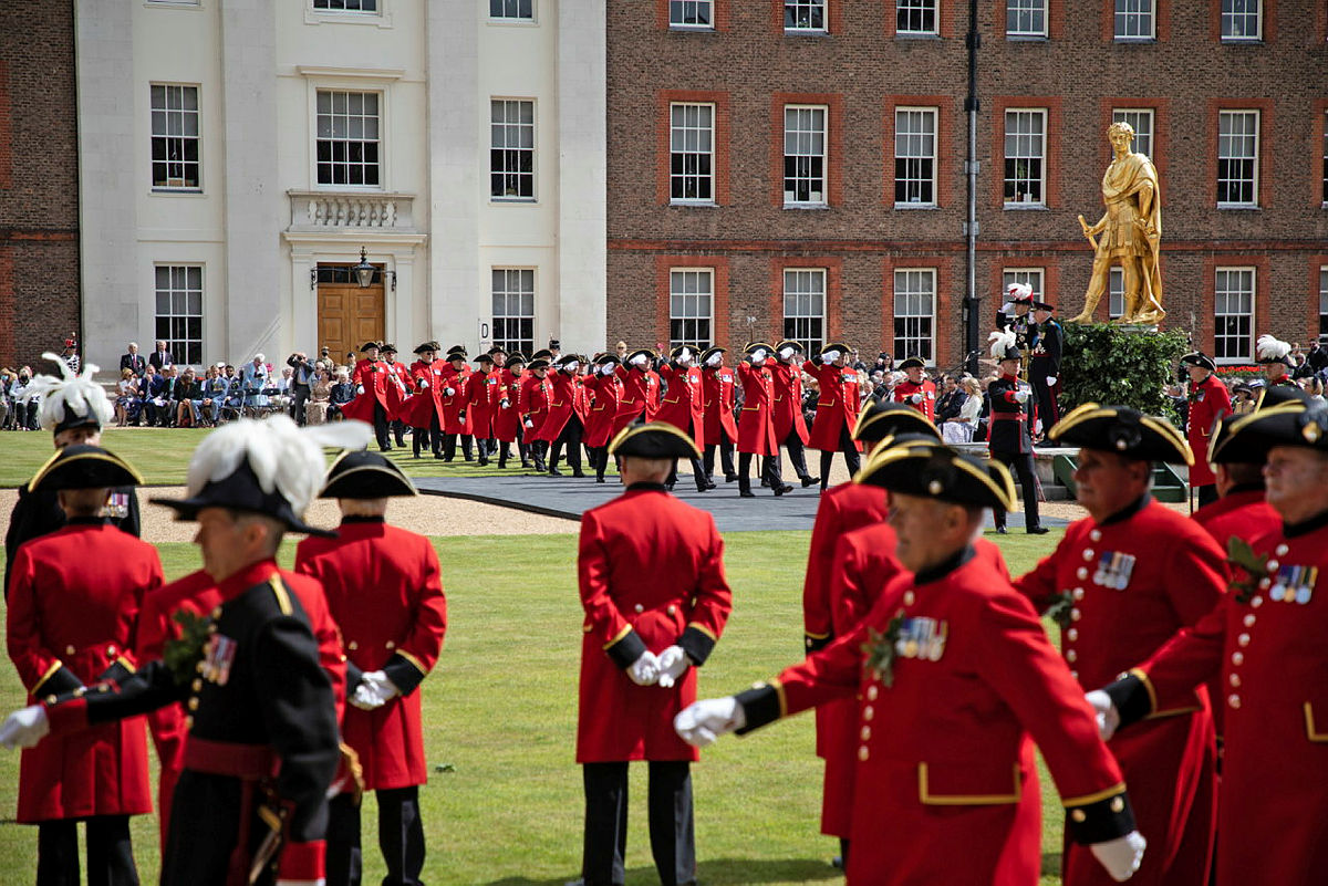 Chelsea Pensioners taking part in Royal Hospital Chelsea's Founder's Day parade at the hospital 