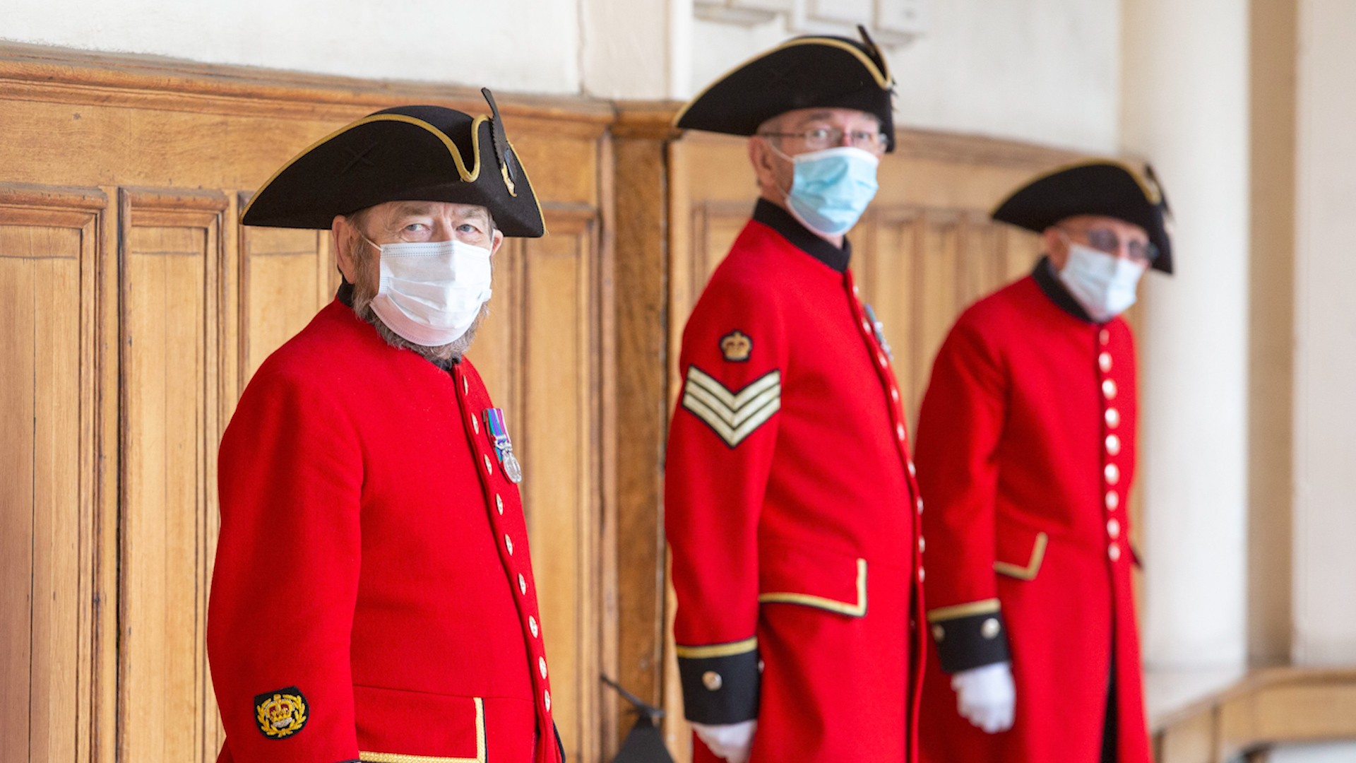Chelsea Pensioners wore face masks during the visit of the Duchess of Cornwall (Picture: PA).