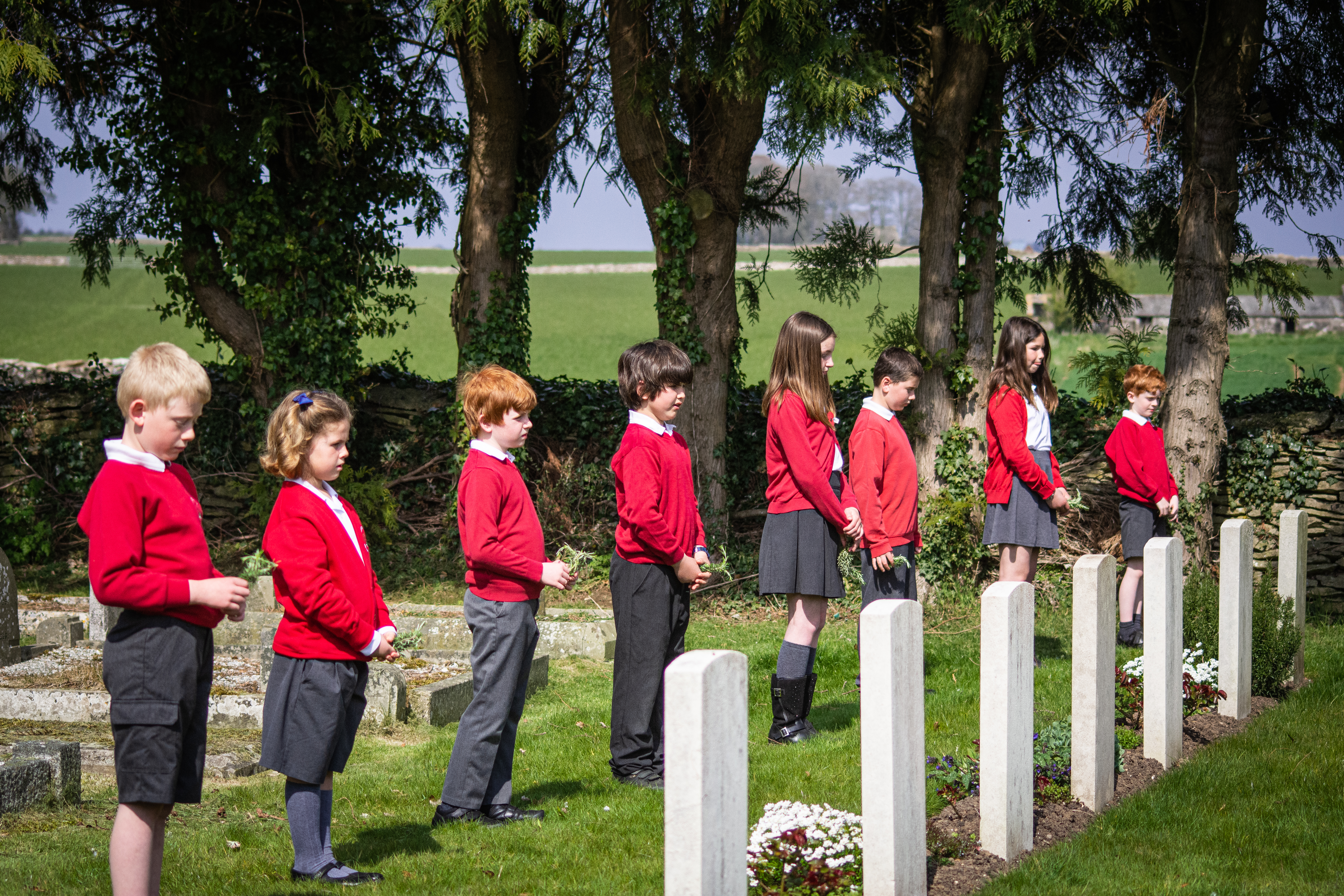 Children from Leighterton Primary School pay respects on Anzac Day at Leighterton Cemetery (Picture: Ian Campbell and Ben Humphries).