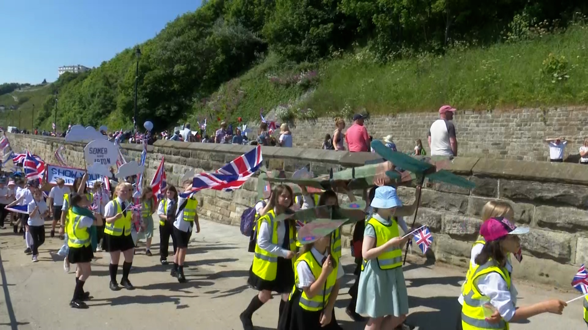 Children with military inspired art pieces during Armed Forces Day parade in Scarborough 23062022 CREDIT BFBS.jpg_.jpg