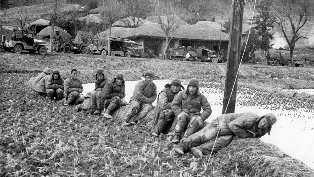 Chinese prisoners of war taken by the Gloucestershire Regiment await medical attention in Korea CREDIT British Army