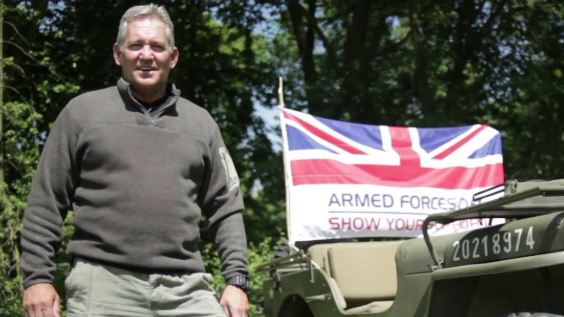 Chris Ryan AKA Colin Armstrong SAS stands beside a tank CREDIT Chris Ryan