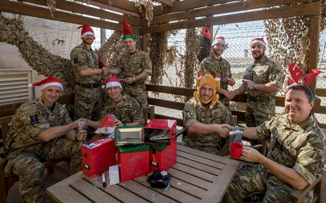 Troops opening Christmas Boxes
