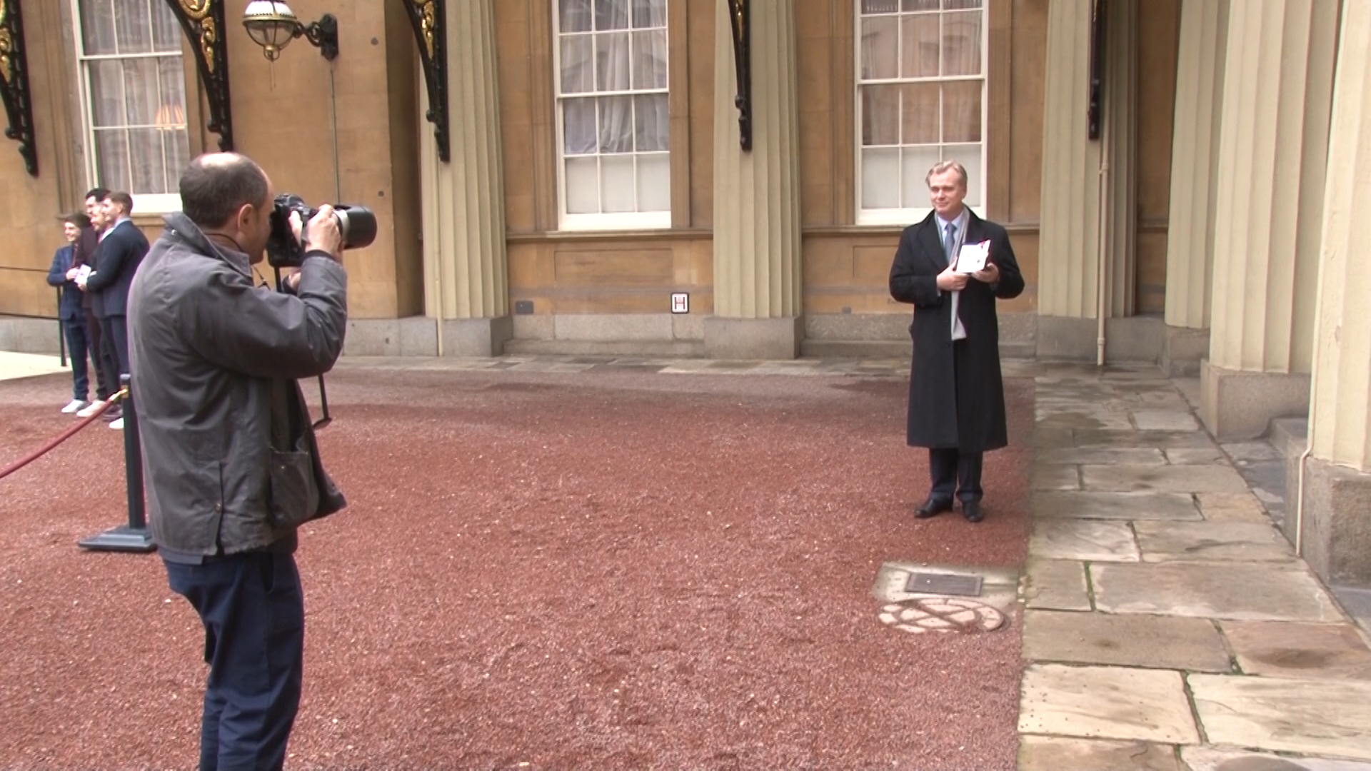 Christopher Nolan poses with his CBE.