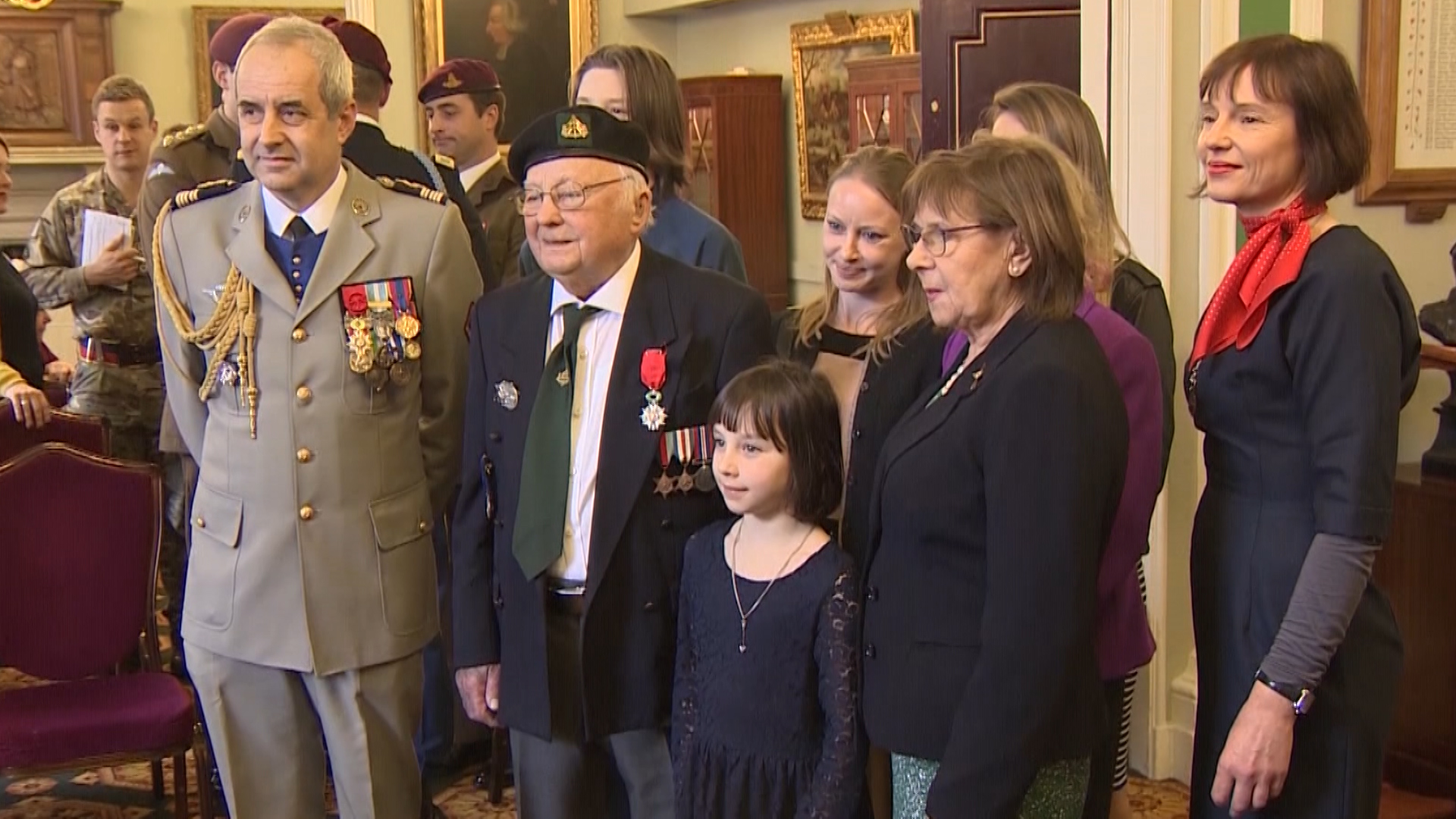 D-Day vet Tony Rampling and family poses with his Legion d Honneur