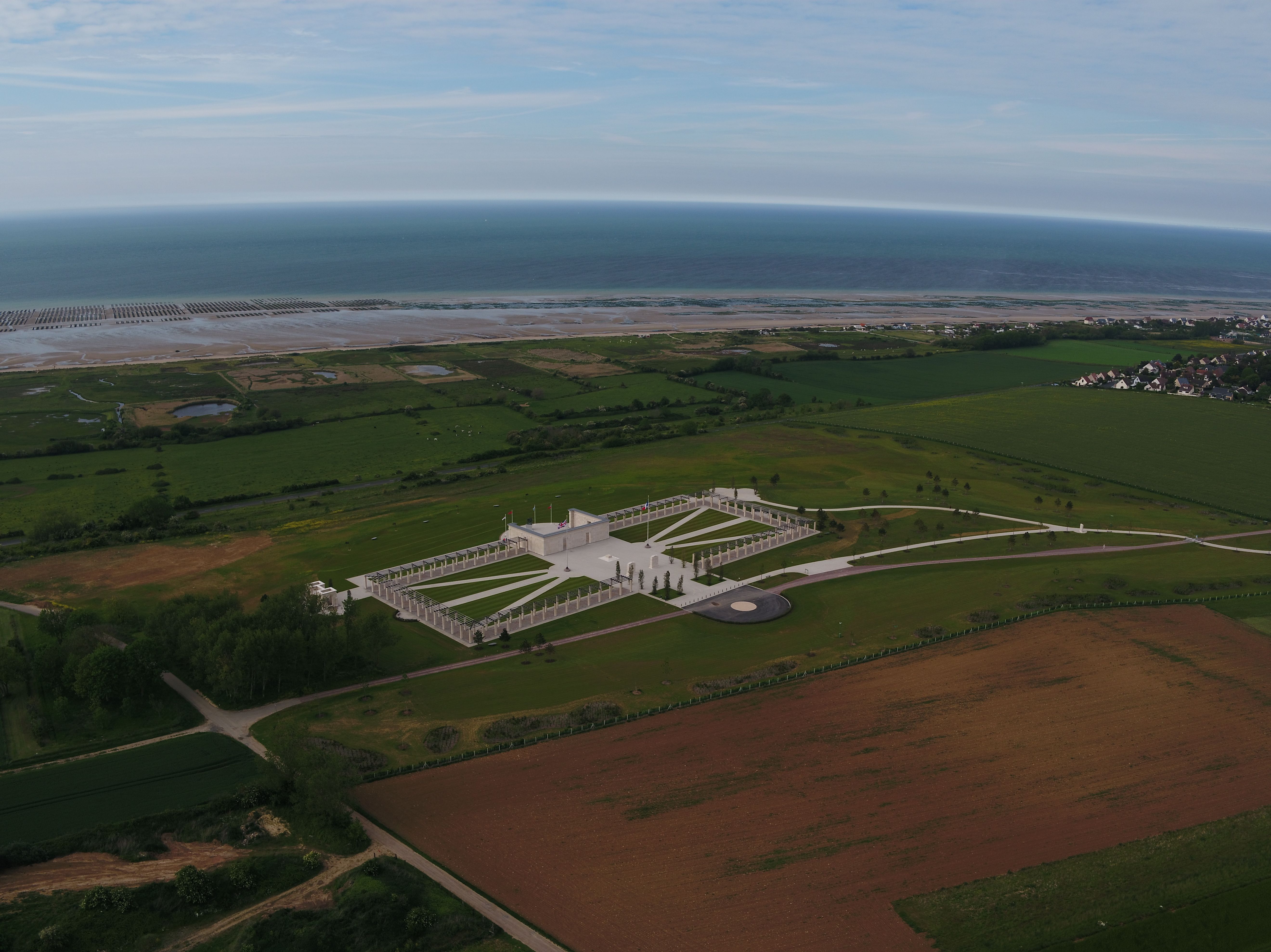 Cloister gardens on the site display a Union Jack design (Picture: britishnormandymemorial.org).