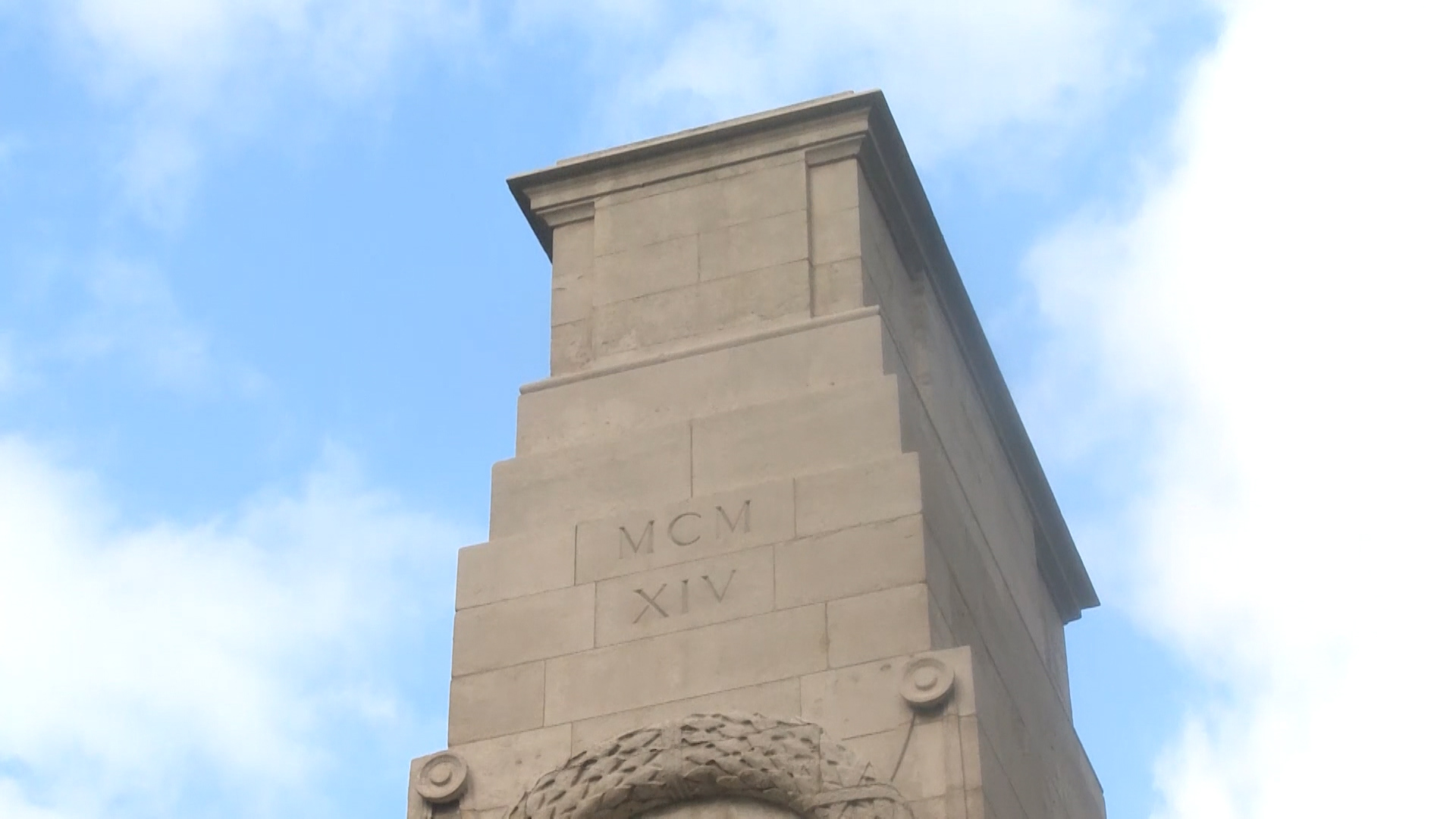 Close up of the top of The Cenotaph. Showing an empty tomb adorned with wreath on top of a tall pylon 041120 CREDIT BFBS