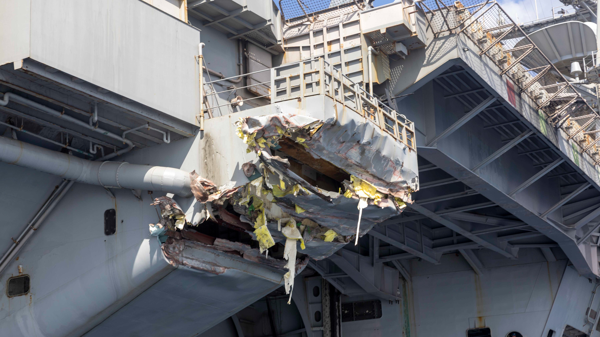 Close view of damage sustained to USS Harry S Truman following collision