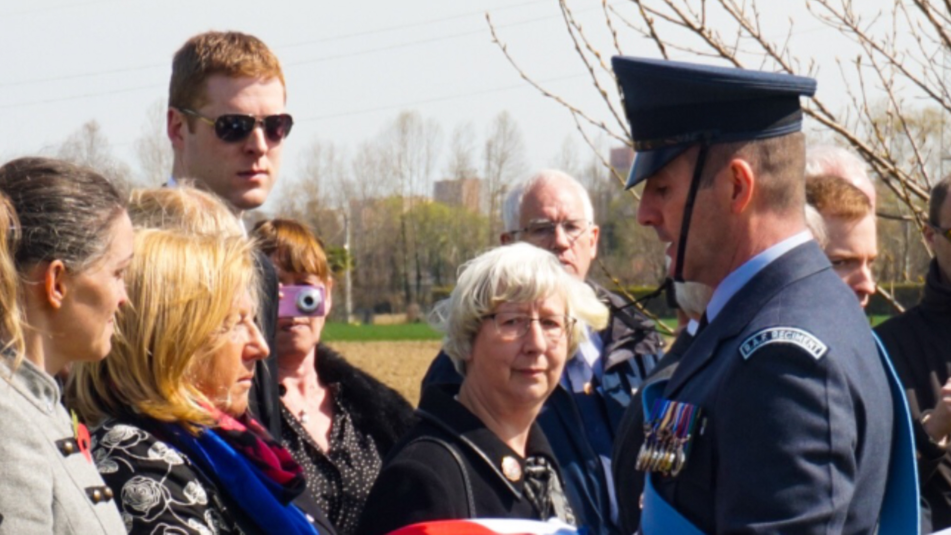 The graveside ceremony was attended by family members (Picture: MOD).