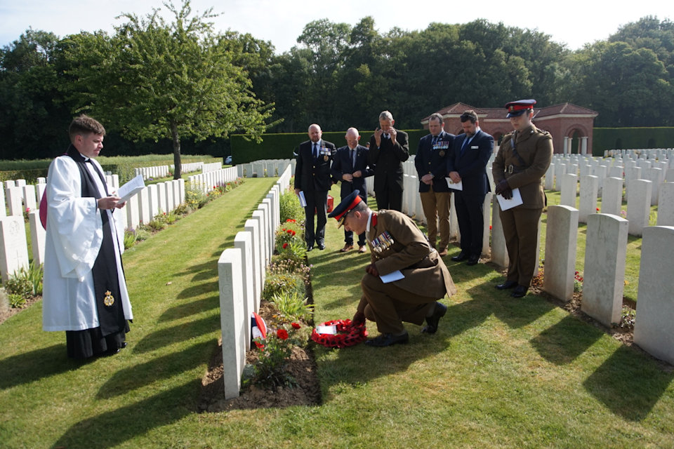 Col Martin David MC, representing the British Embassy in Paris, lays a wreath at the graveside of Cpl Davies 190619 CREDIT Crown Copyright.JPG