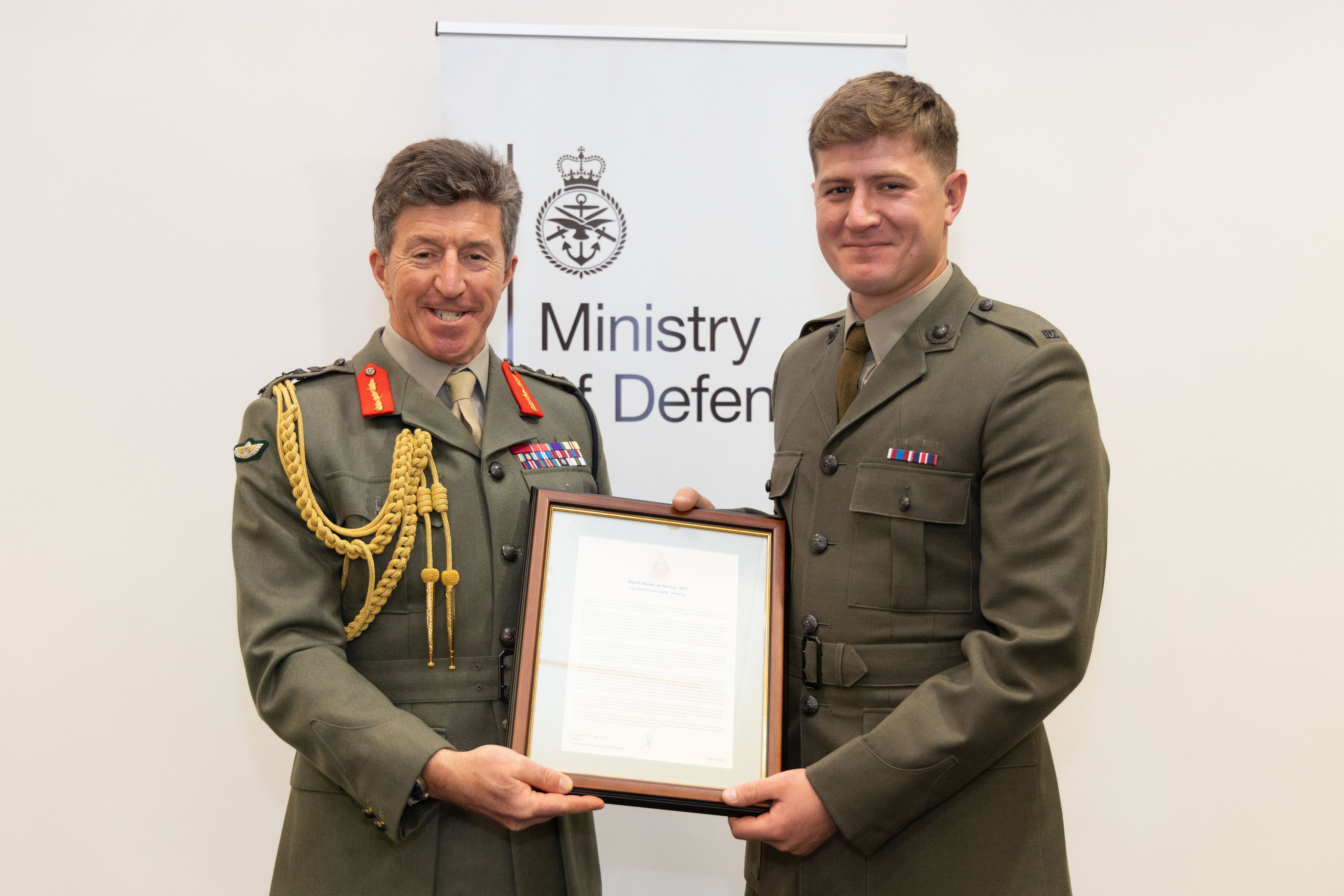 Commandant General of the Royal Marines awarding the Royal Marine of the Year award to Corporal Jack Crawford 061223 CREDIT MOD