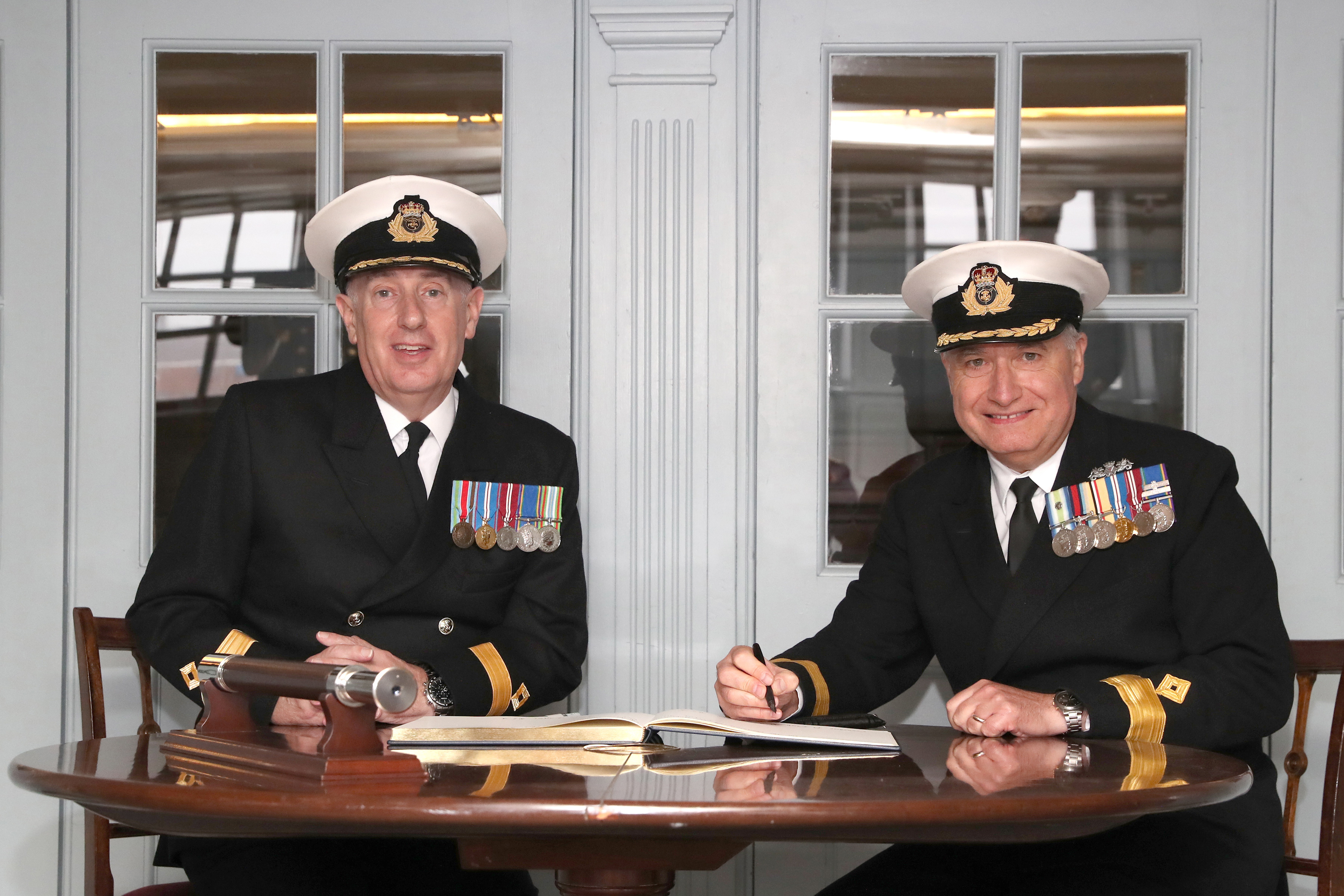 Commodore David Eagles Takes Over as New Head of RFA from Commodore Duncan Lamb in HMS Victorys Great Cabin 30102020 CREDIT ROYAL NAVY