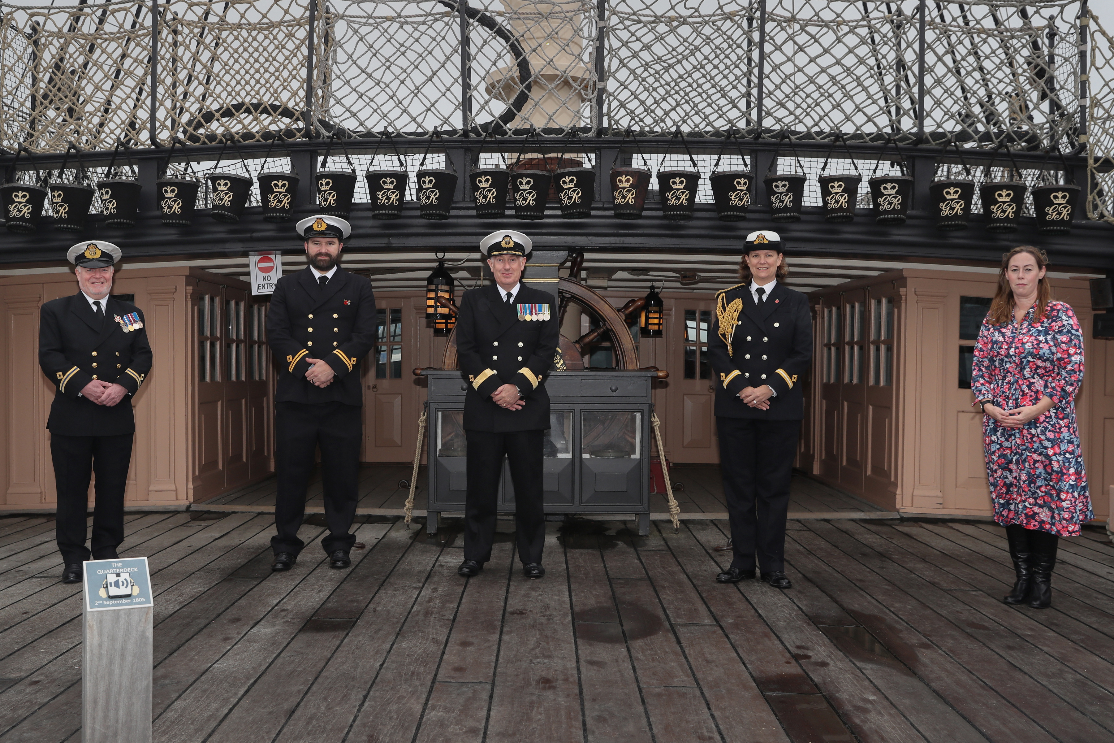 Commodore David Eagles (centre) with his staff on board HMS Victory (Picture: Royal Navy).