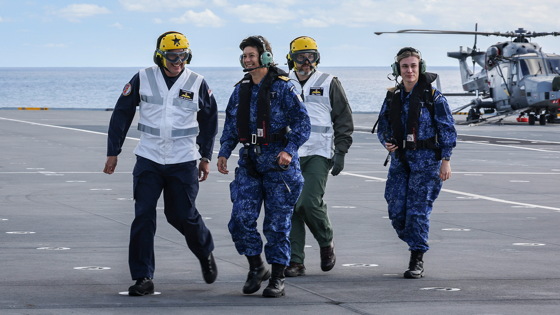 Commodore James Blackmore, Commander of the UK Carrier Strike Group alongside crew on HMS Queen Elizabeth (Picture: Royal Navy)