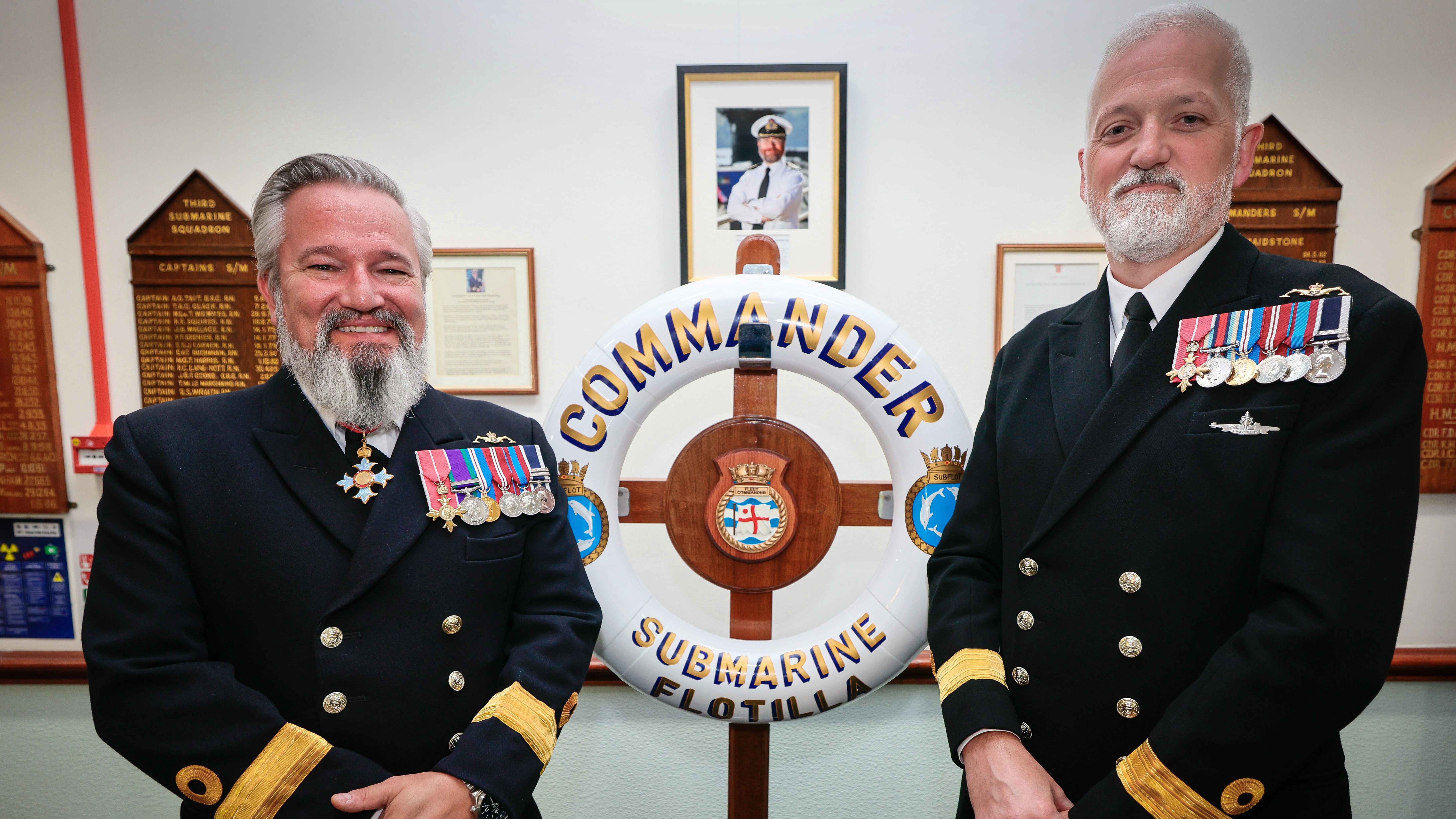 Commodore Jim Perks (left) and Commodore Paul Dunn (right) handing over at Belmore House at HMNB Clyde 26072022 CREDIT MOD, Royal Navy.jpg