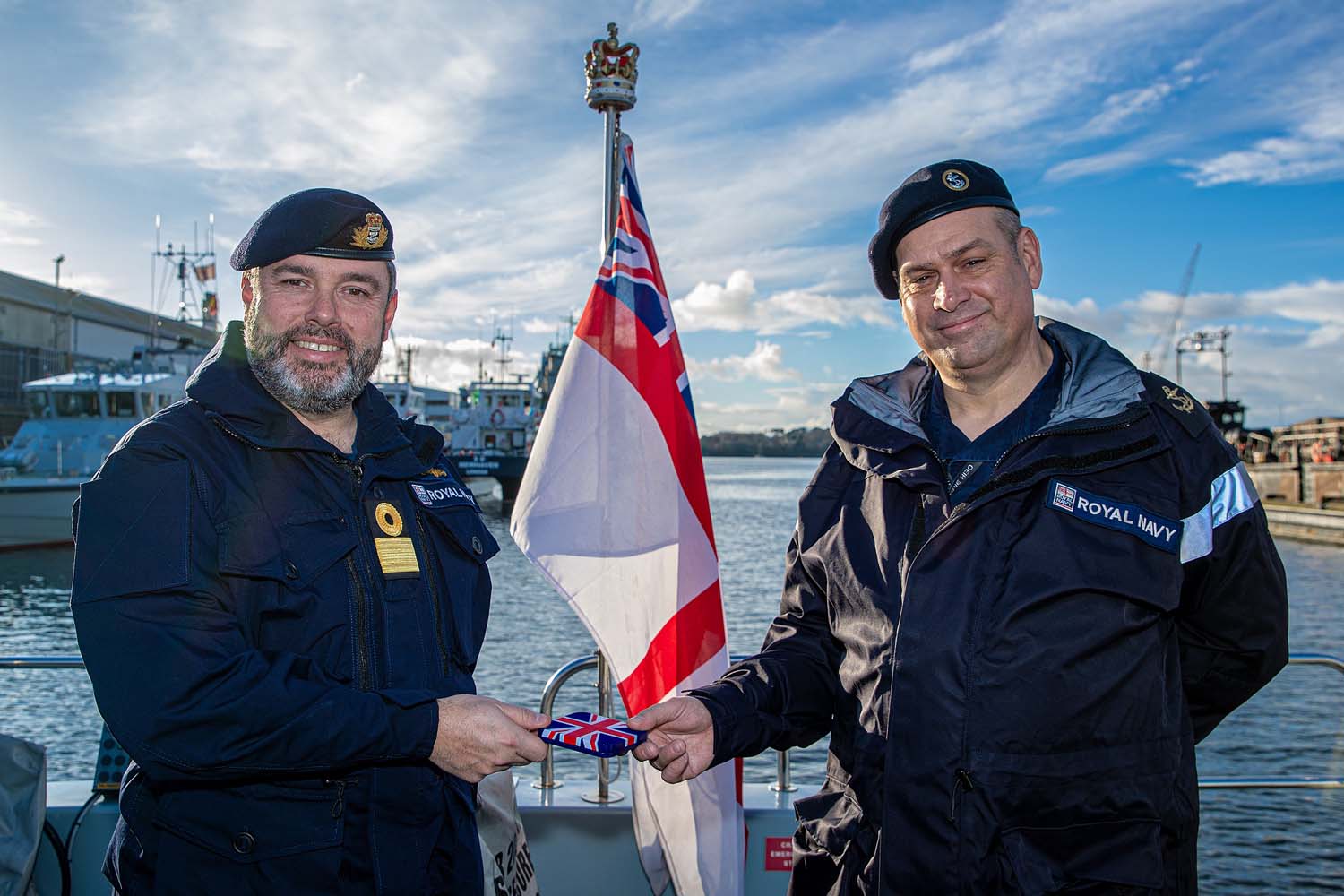 Cover image: Commodore Tim Neild presenting the LSA5K award to LS John Gibson on board HMS Magpie (Picture: Royal Navy).