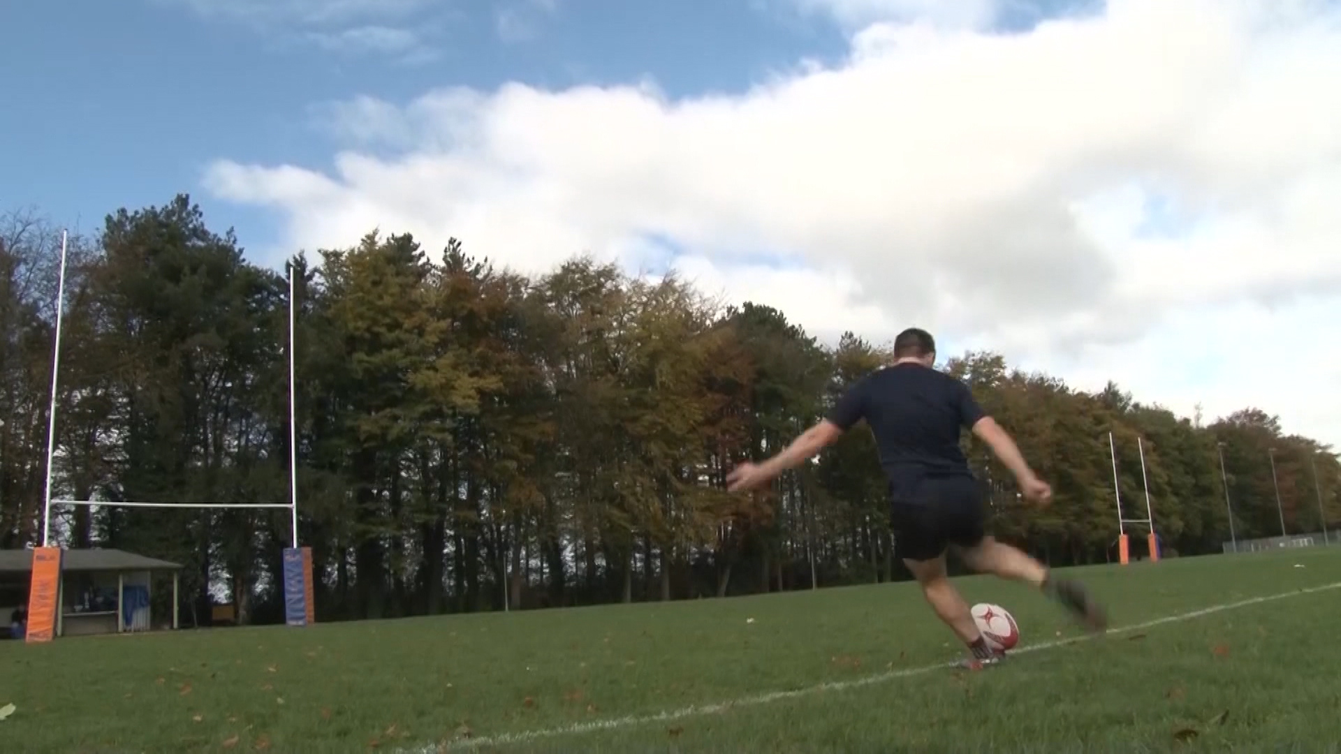 Craig Monaghan kicking still.