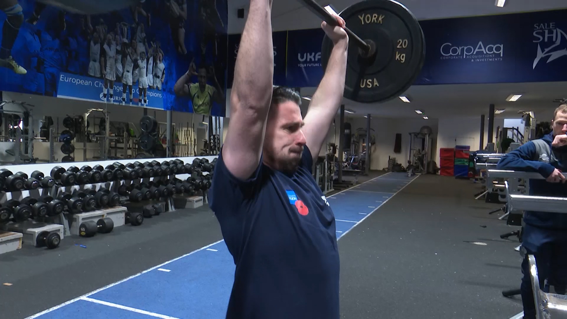 Craig Monaghan lifting weights.