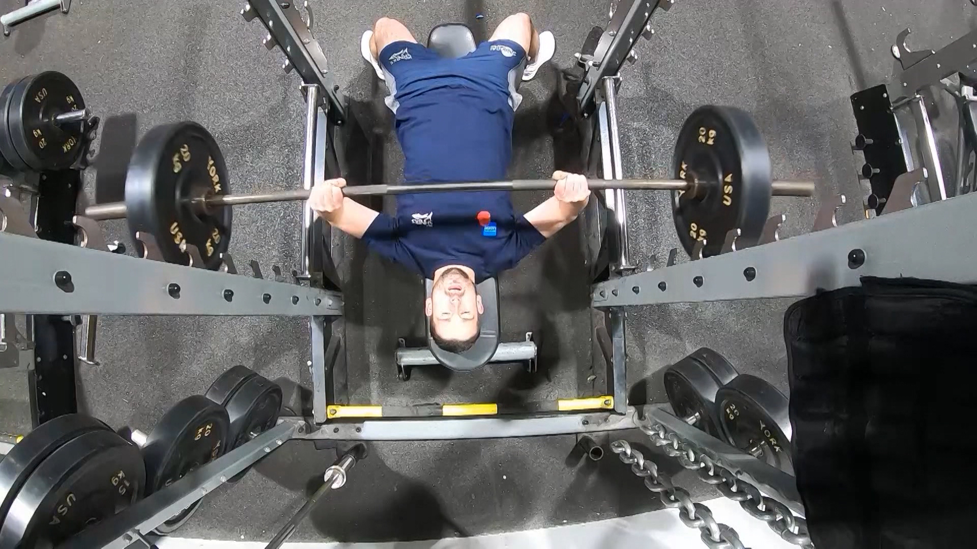 Craig Monaghan lifting weights.