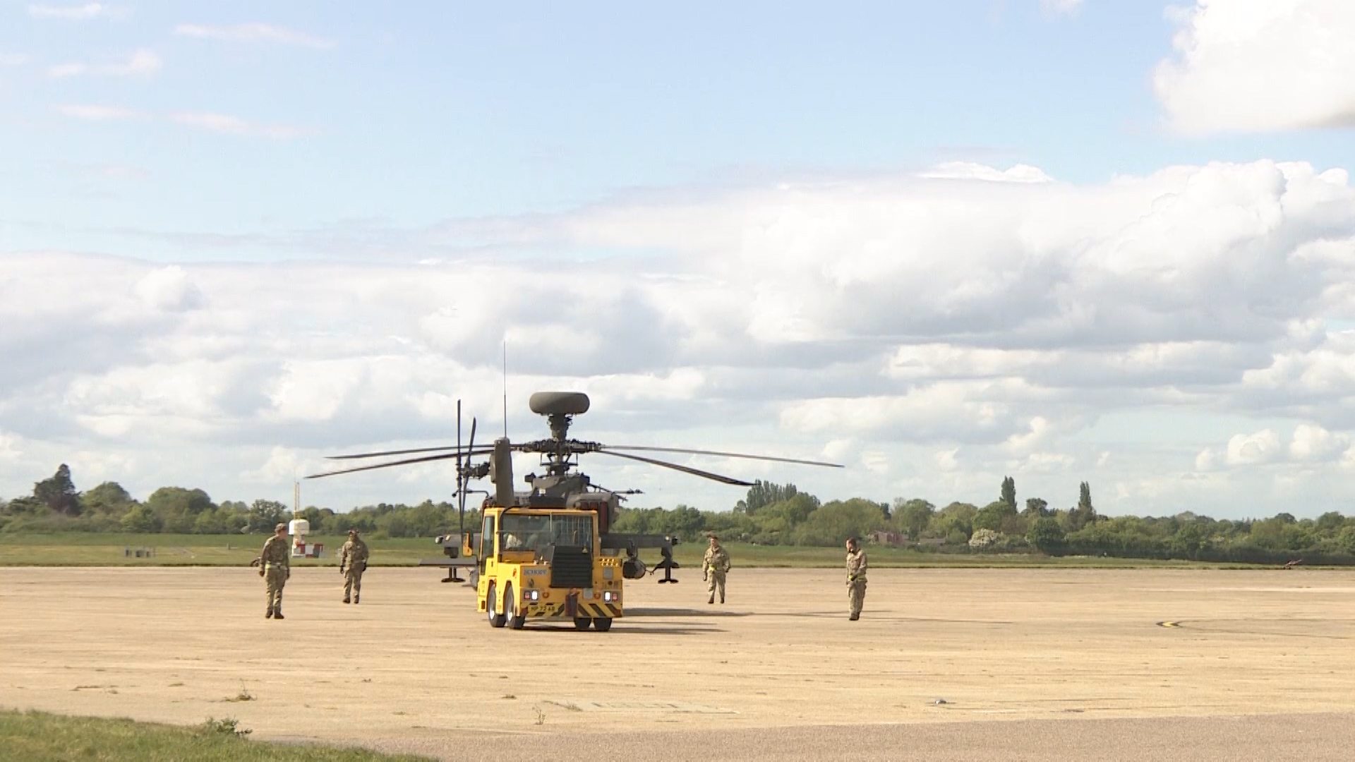 Crew at Wattisham Airfield moving an aircraft while enforcing social distancing during covid19 180520 CREDIT BFBS.jpg
