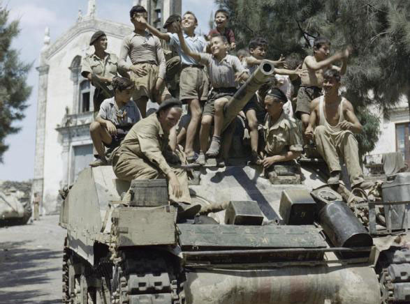 The "Shirkers" In Italy And Deposing Of Mussolini Children on a Sherman Mk III tank in Sicily in WWII